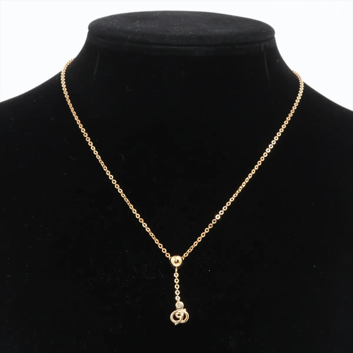CD logo necklace, gold plated with rhinestones. Shows signs of wear, — view 5