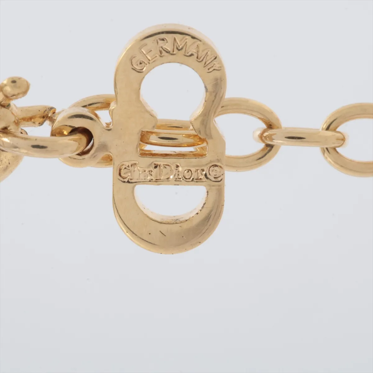 CD logo necklace, gold-plated with rhinestones. Shows signs of wear, — view 4