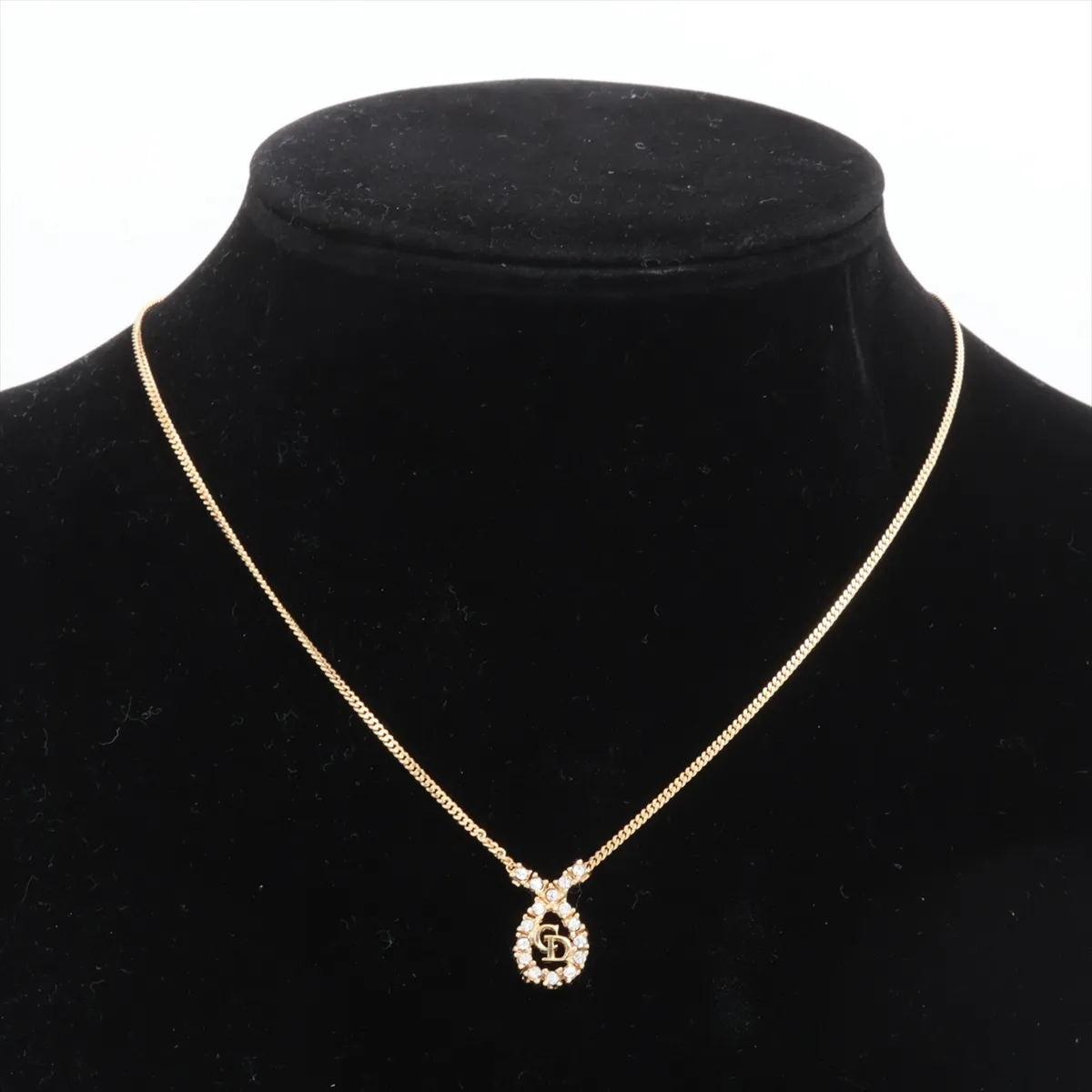 CD logo necklace, gold-plated with rhinestones. Shows signs of wear, — view 5