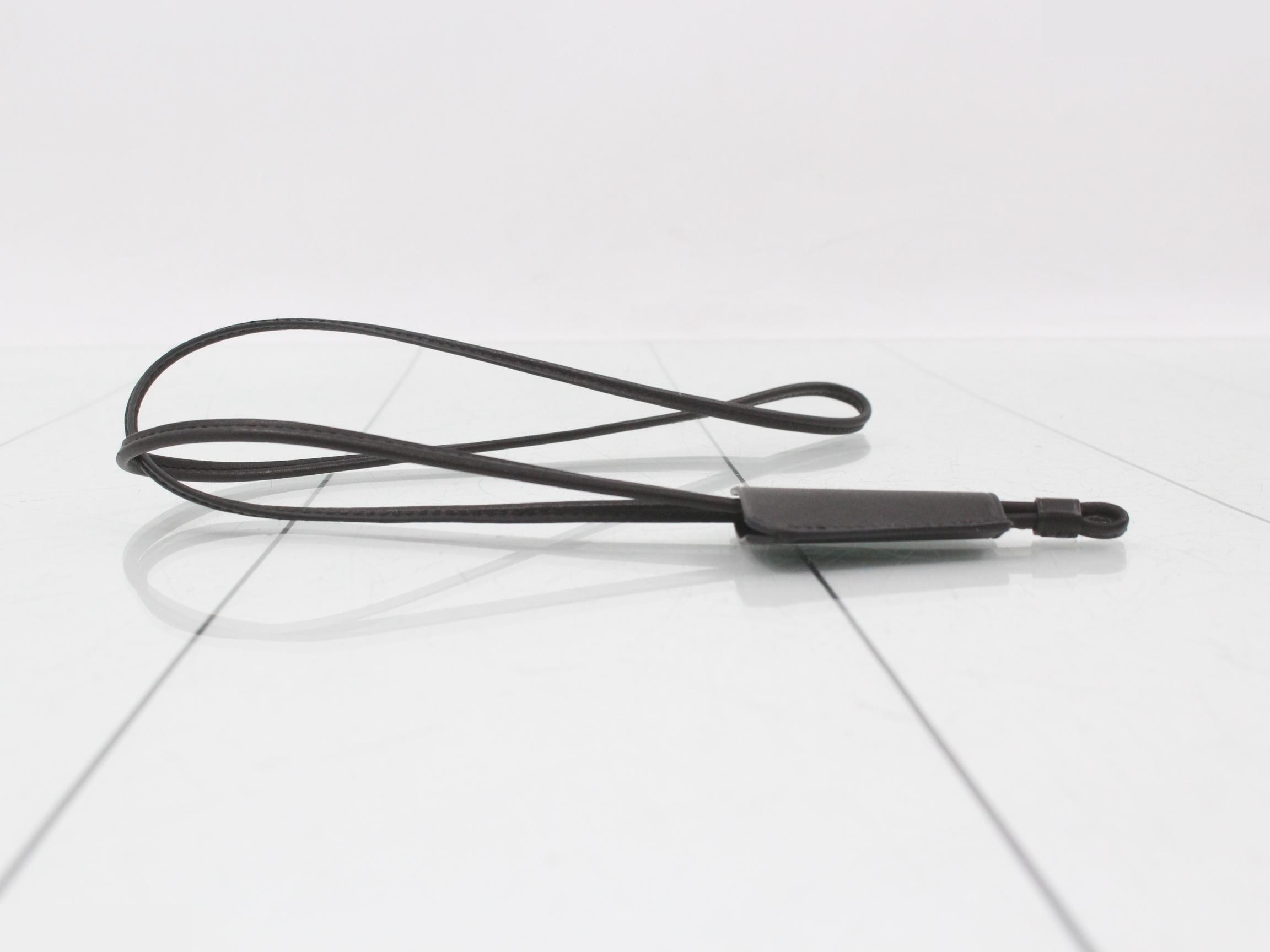 Leather clochette, long type, with loop closure and embossed interior. — view 3