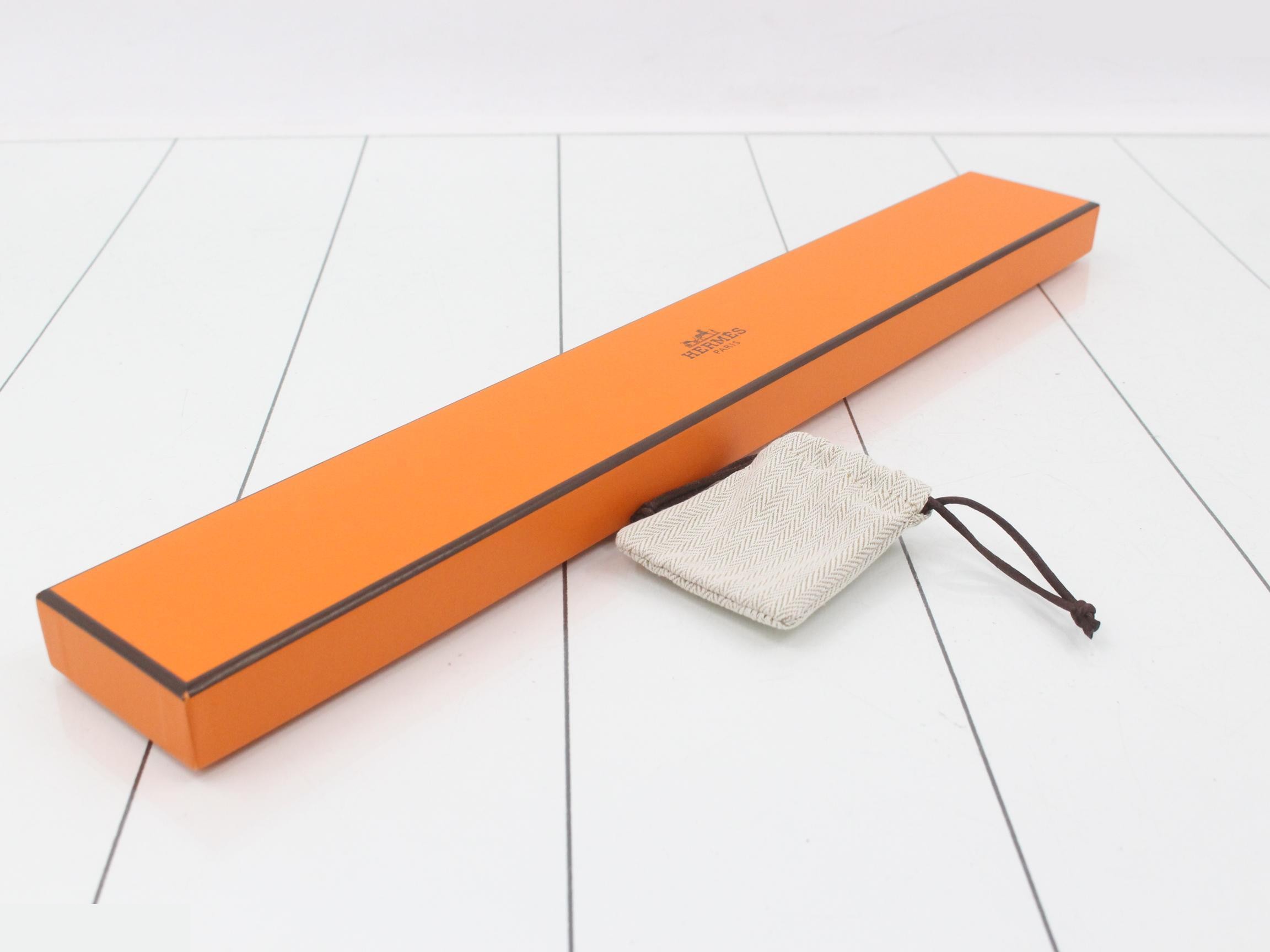 Leather clochette, long type, with loop closure and embossed interior. — view 4