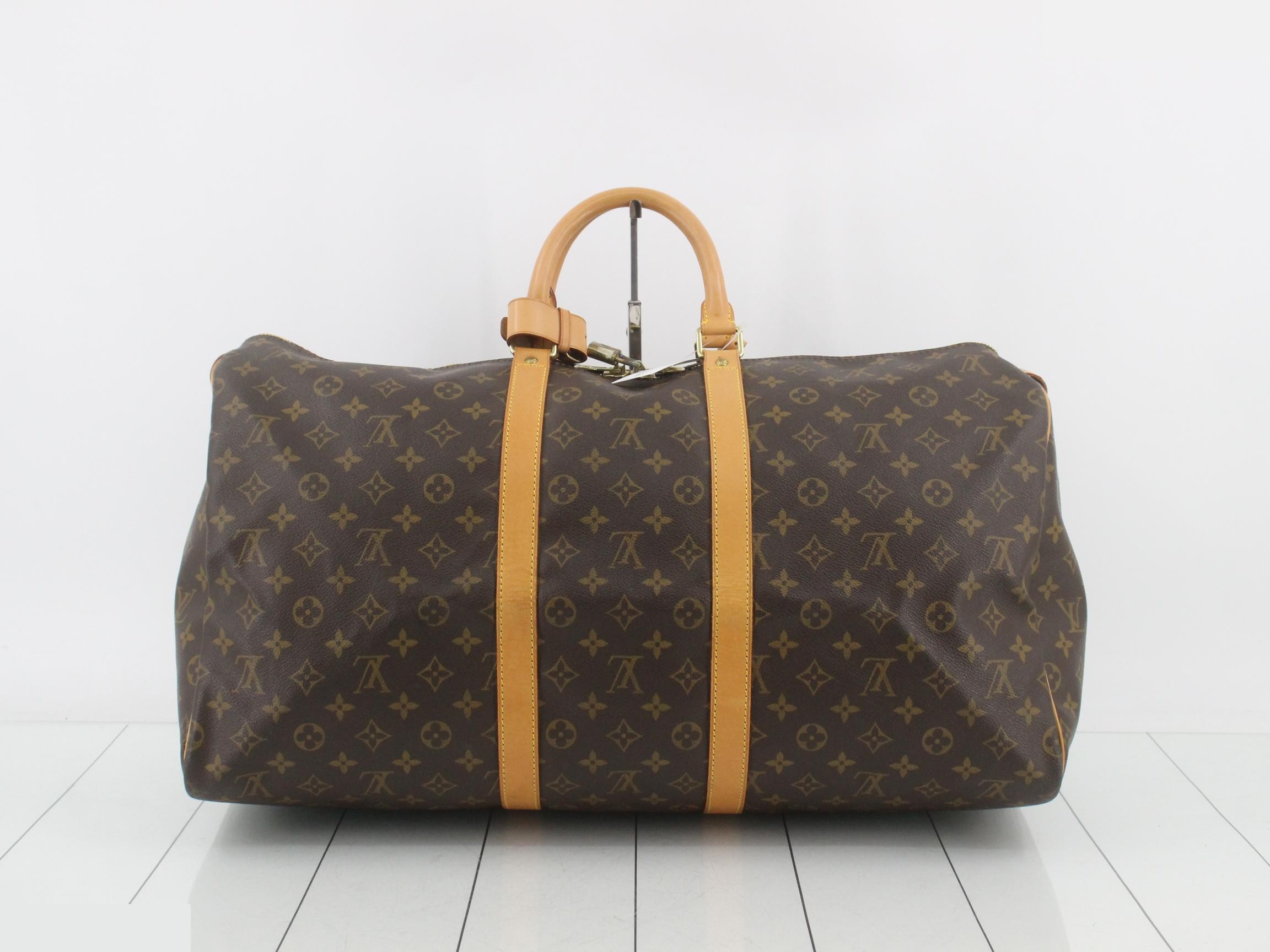 Keepall 55 M41424 Monogram with padlock, handle strap, and name tag. — view 2