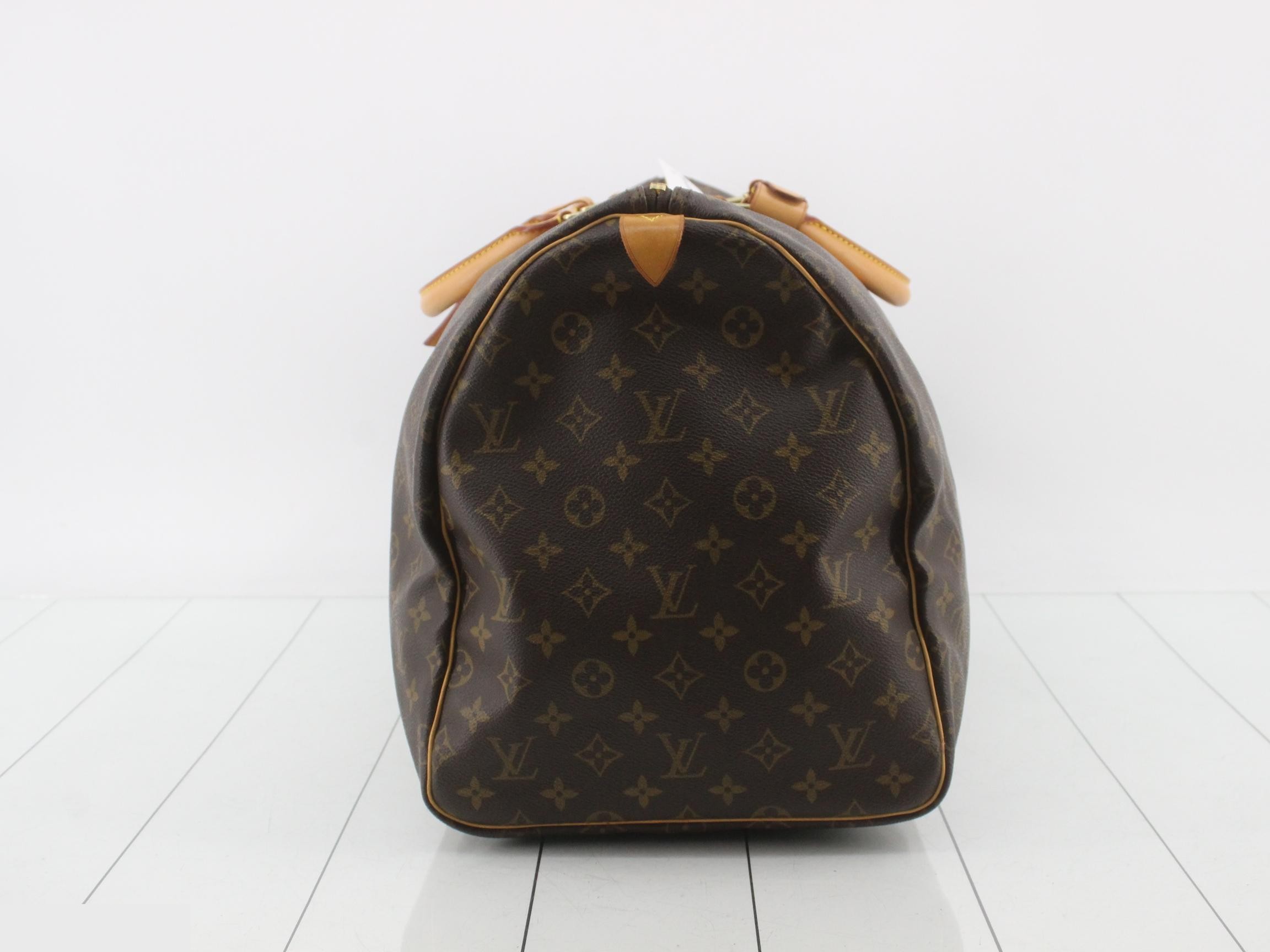 Keepall 55 M41424 Monogram with padlock, handle strap, and name tag. — view 3