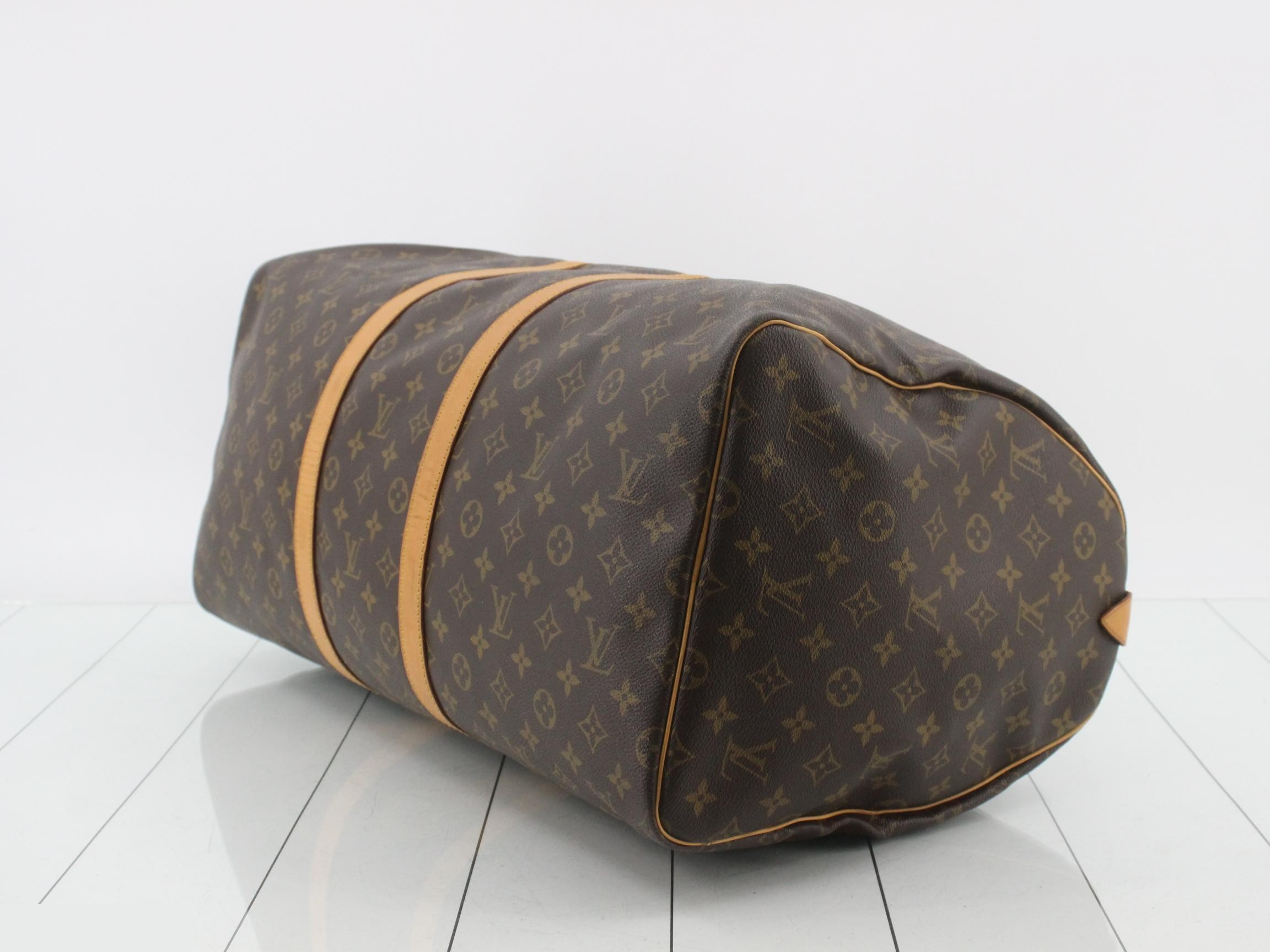 Keepall 55 M41424 Monogram with padlock, handle strap, and name tag. — view 6