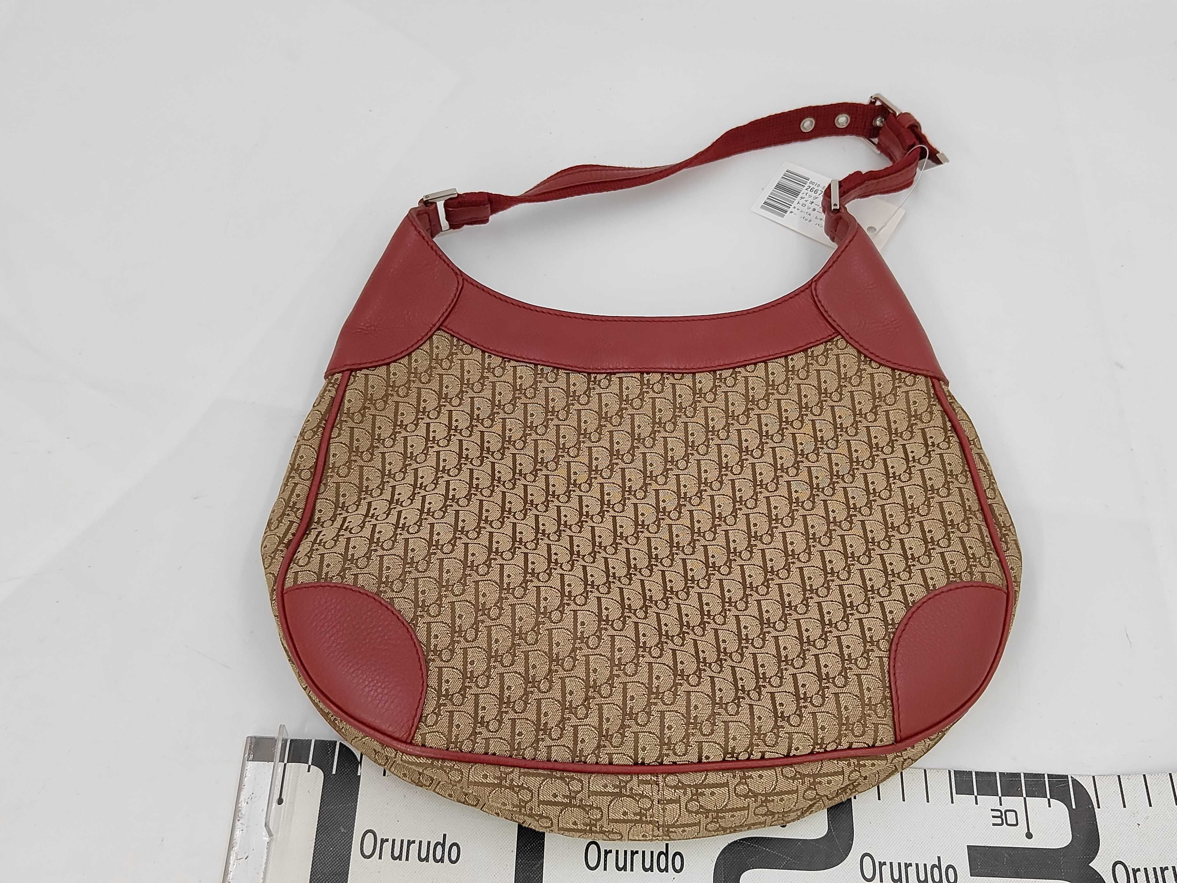 Trotter Canvas Leather One Shoulder Back Punching Hardware Handbag — view 2
