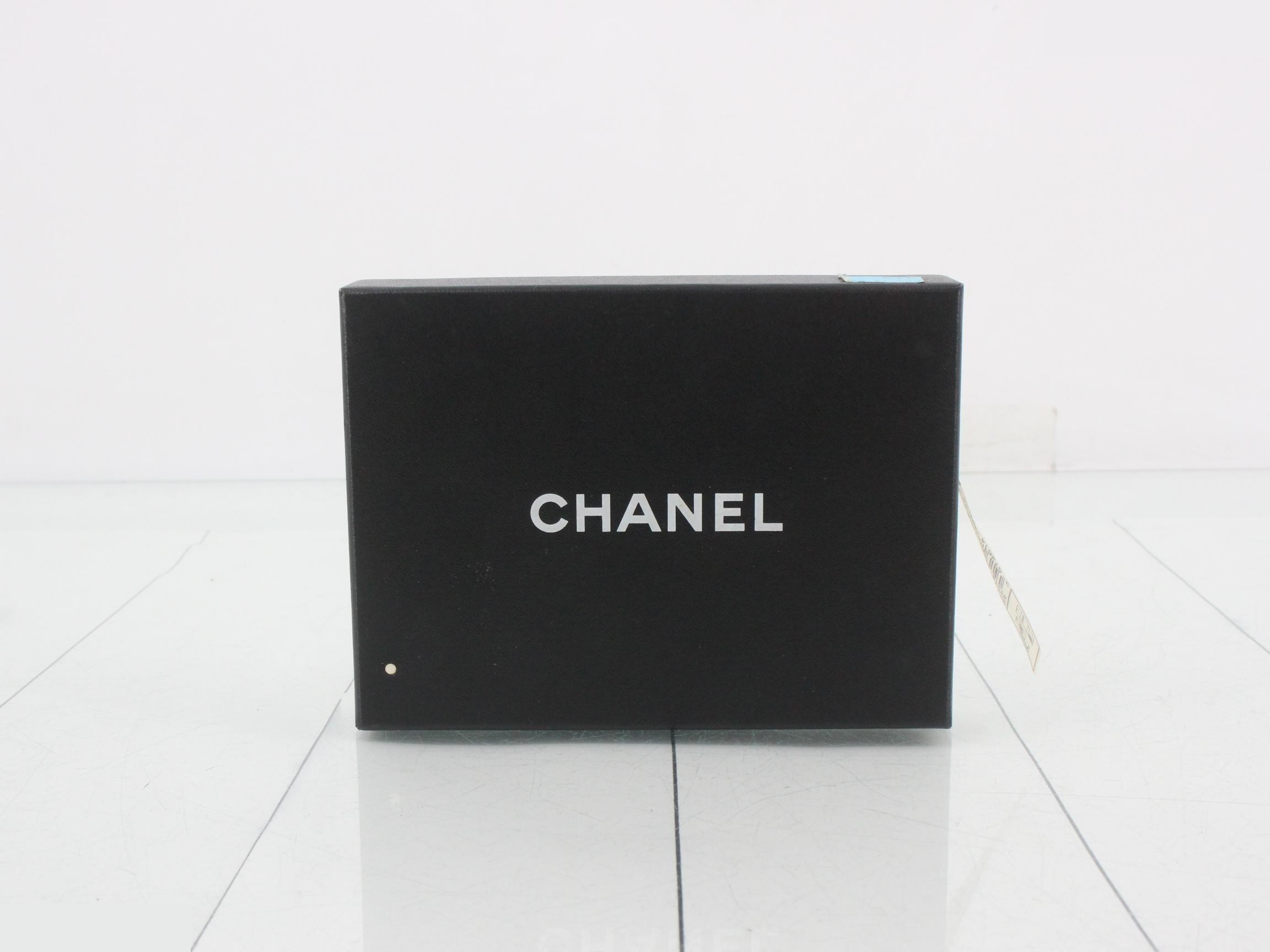 Caviar leather trifold wallet with Coco Mark, serial number 9. — view 5