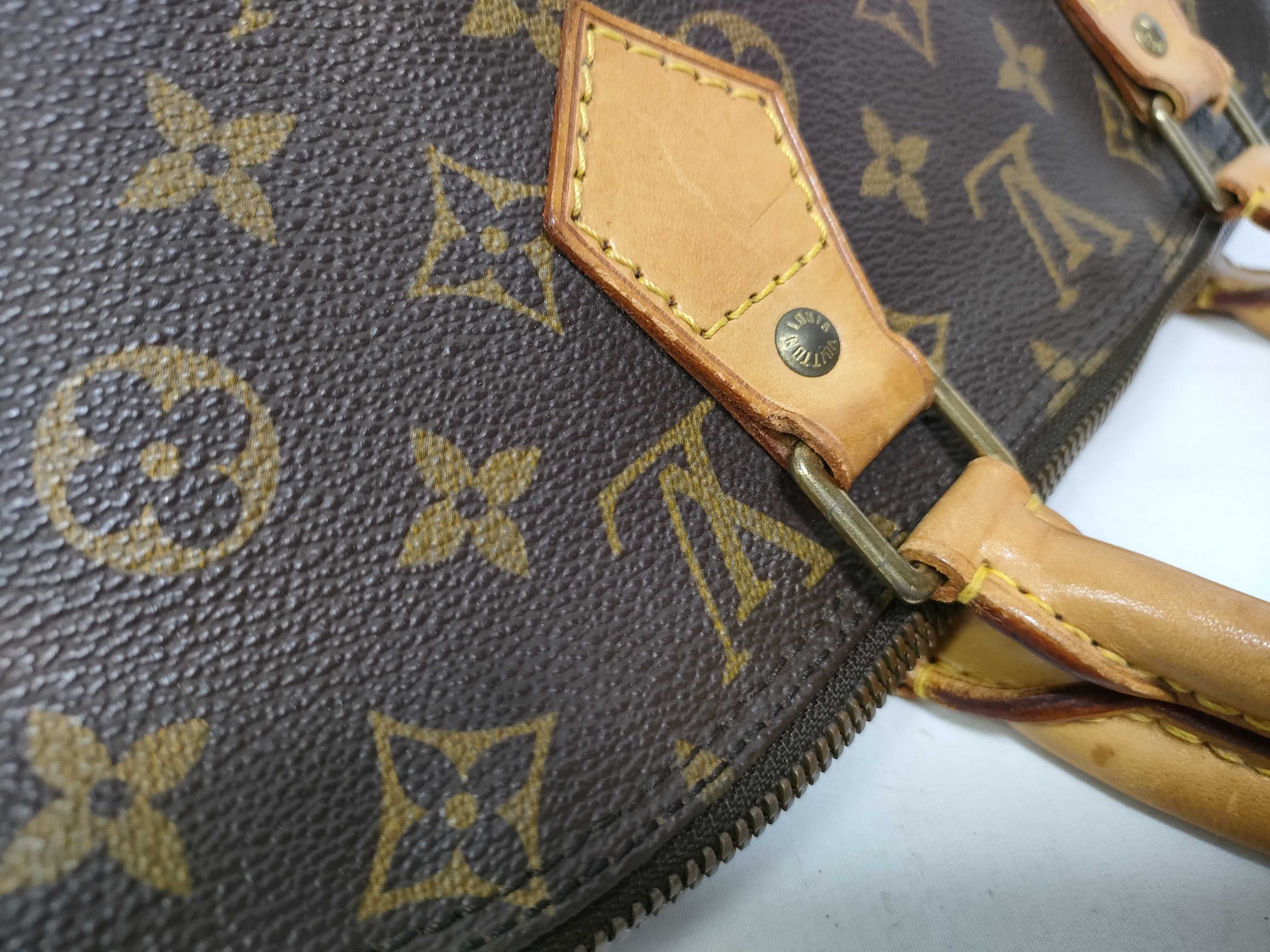 Monogram Alma M51130 Brown VI0934 Handbag — view 10