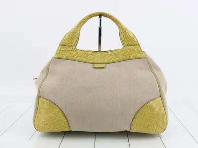 Leather and canvas combination handbag, with dust bag.