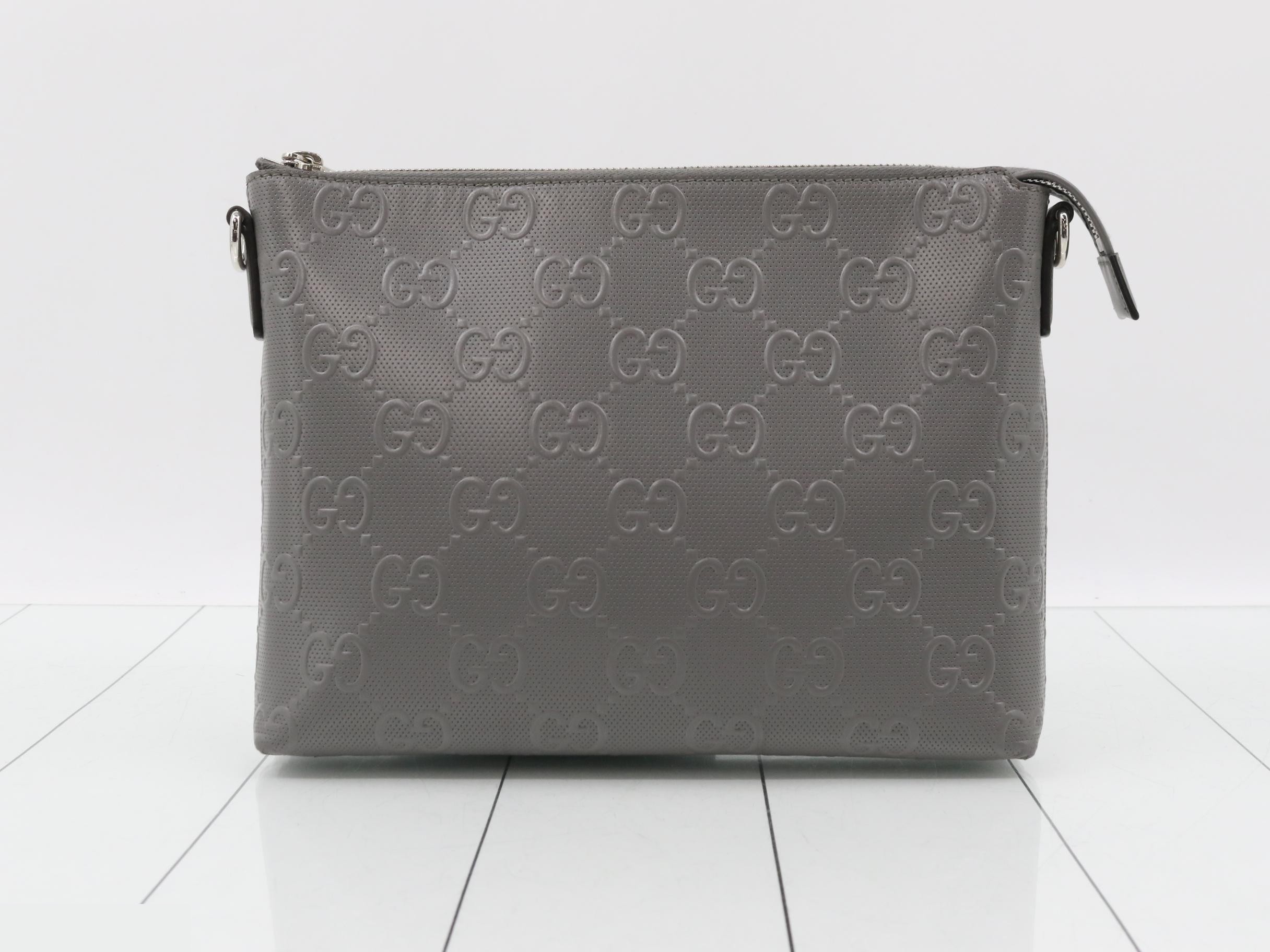 696009 GG Embossed Medium Messenger