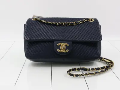 V-stitch shoulder bag