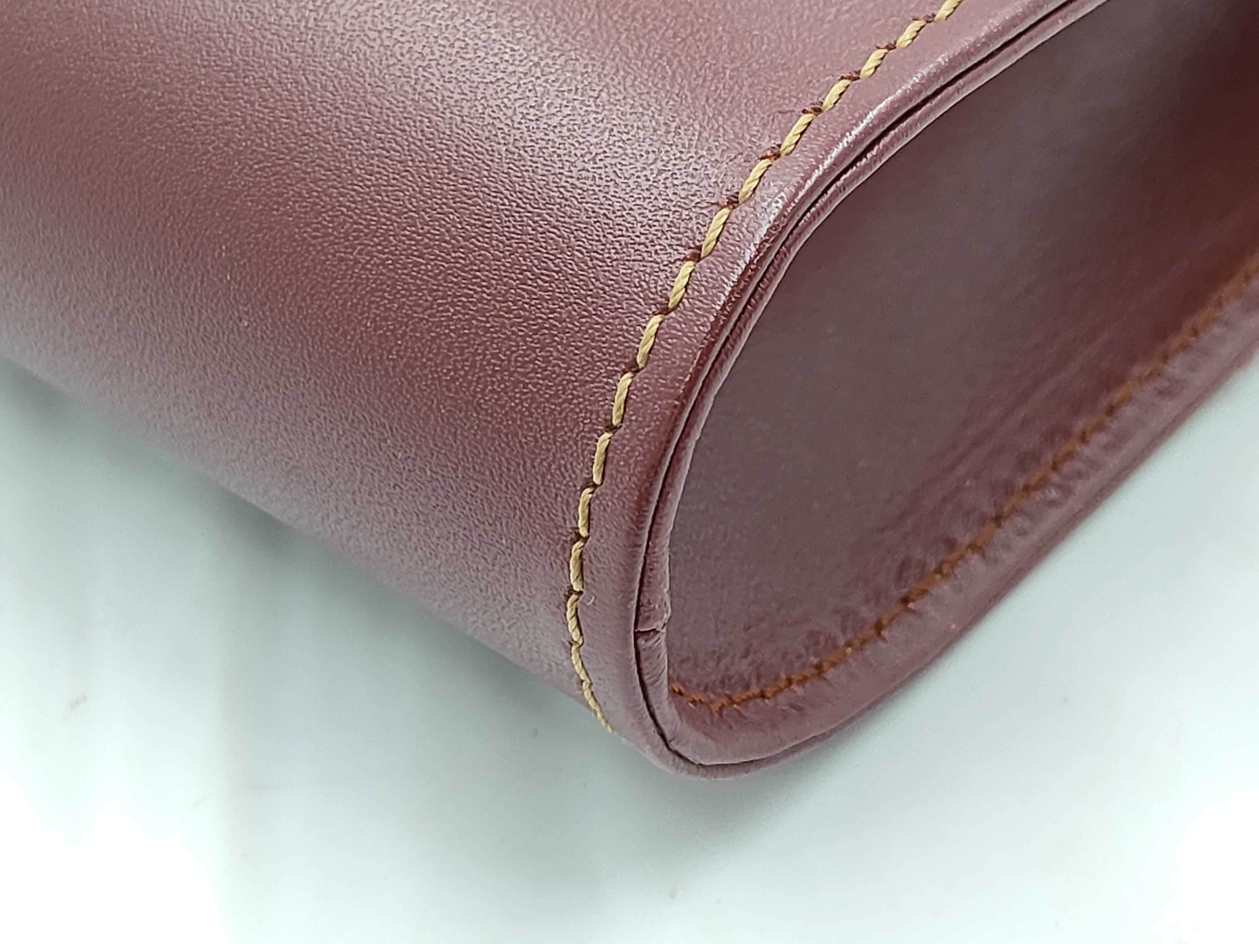 clutch bag with warranty card. — view 3