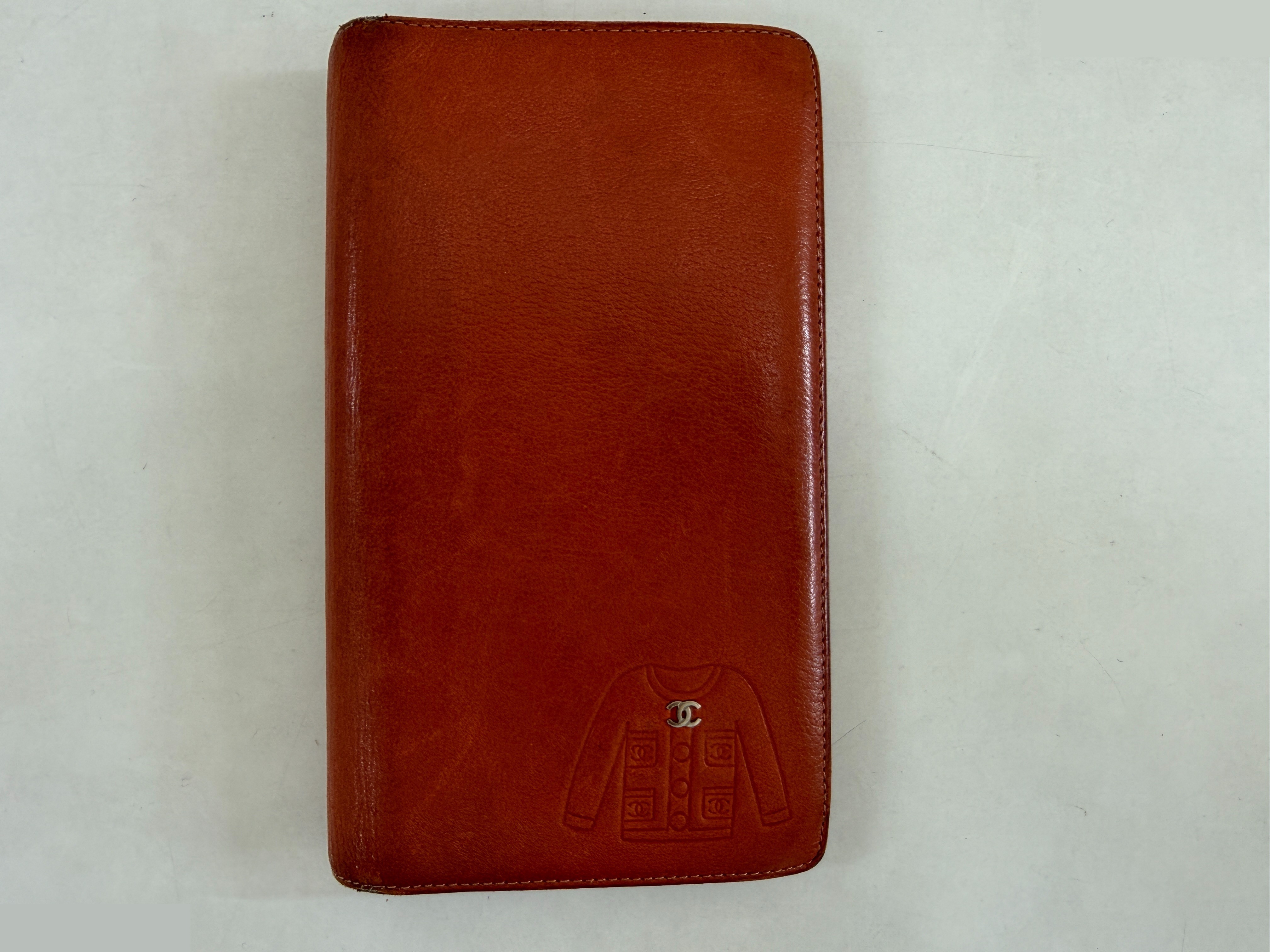Bi-fold long wallet, Coco Mark & jacket motif, serial number 13.
