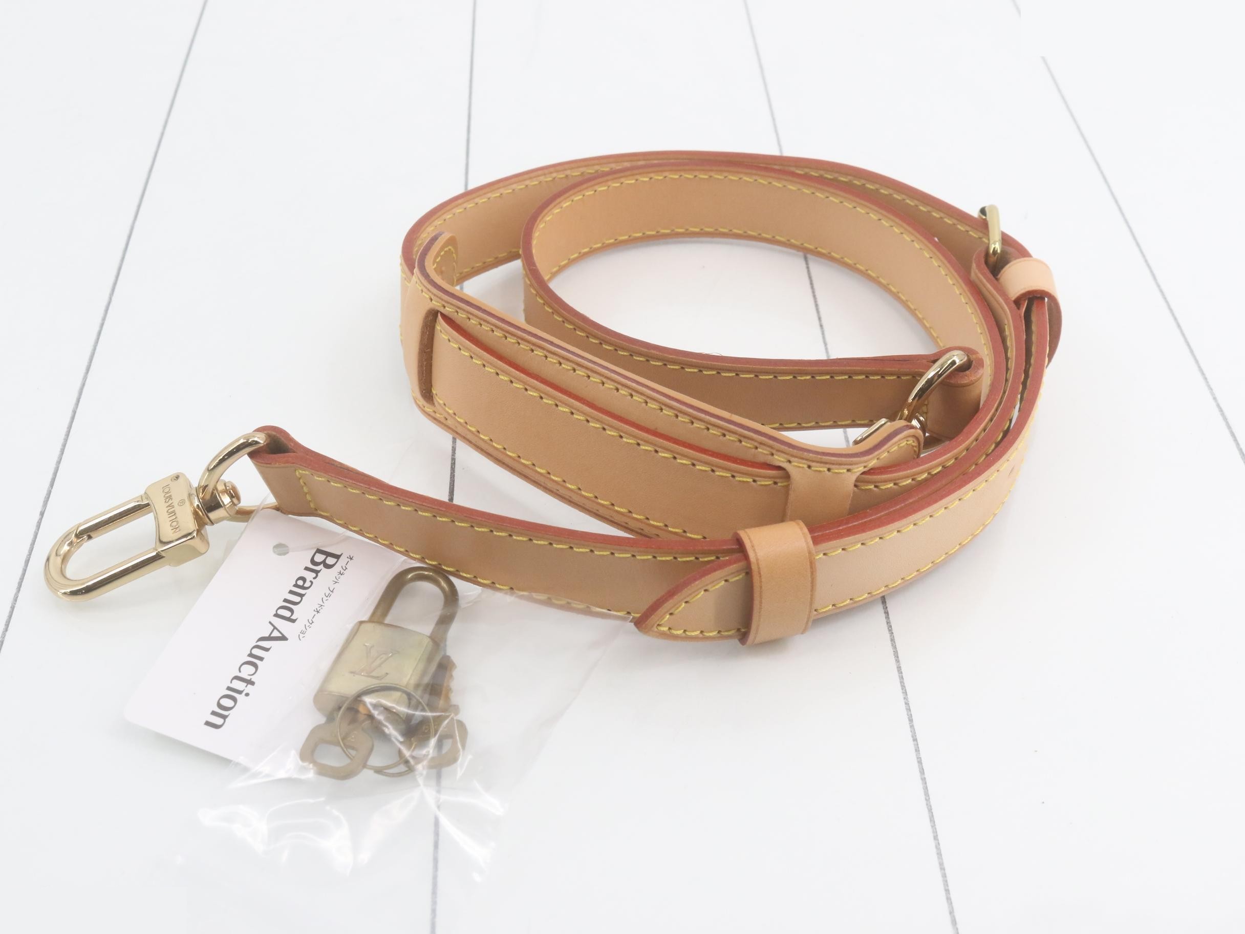 Keepall Bandoulière 55 FL0050 - Includes strap, handle, name tag, and key. — view 7