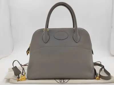 Bolide 31 Handbag in Taurillon Clemence Leather, Etoupe Leather, Gold Hardware, C Stamp