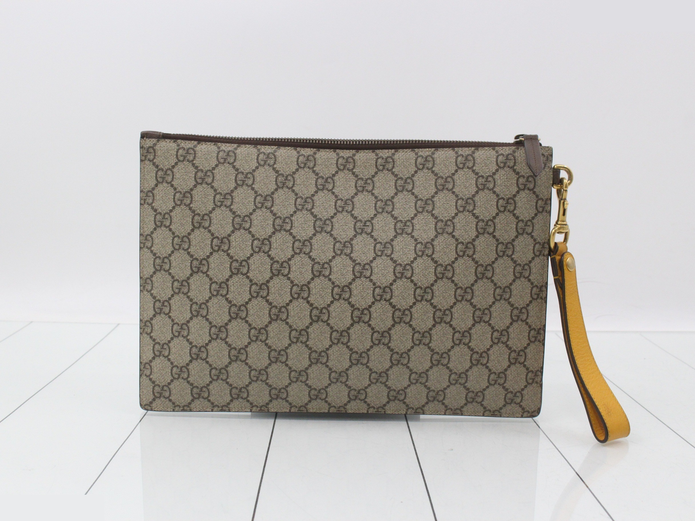 GG Supreme Leather Tiger Head Clutch Bag — view 2