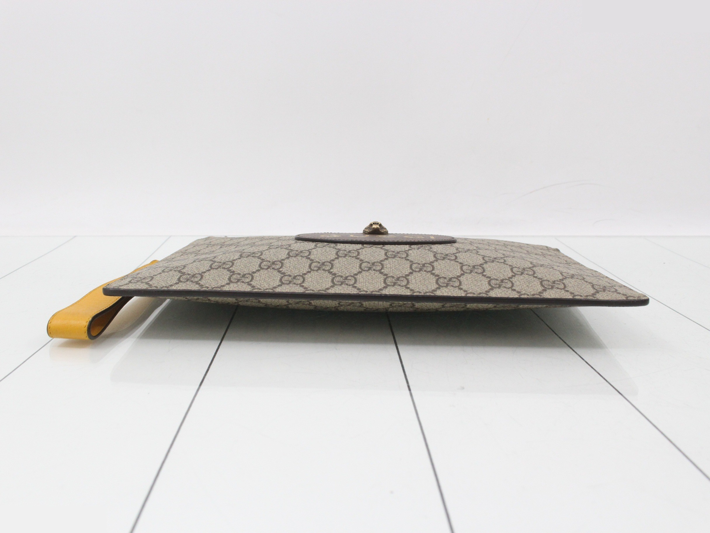 GG Supreme Leather Tiger Head Clutch Bag — view 3