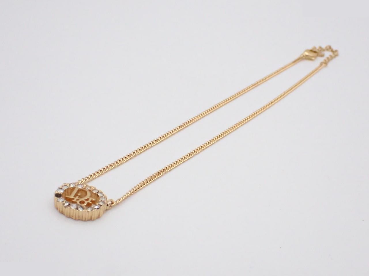 Two items: Dior logo necklace and earrings, rhinestone, metal. — view 2