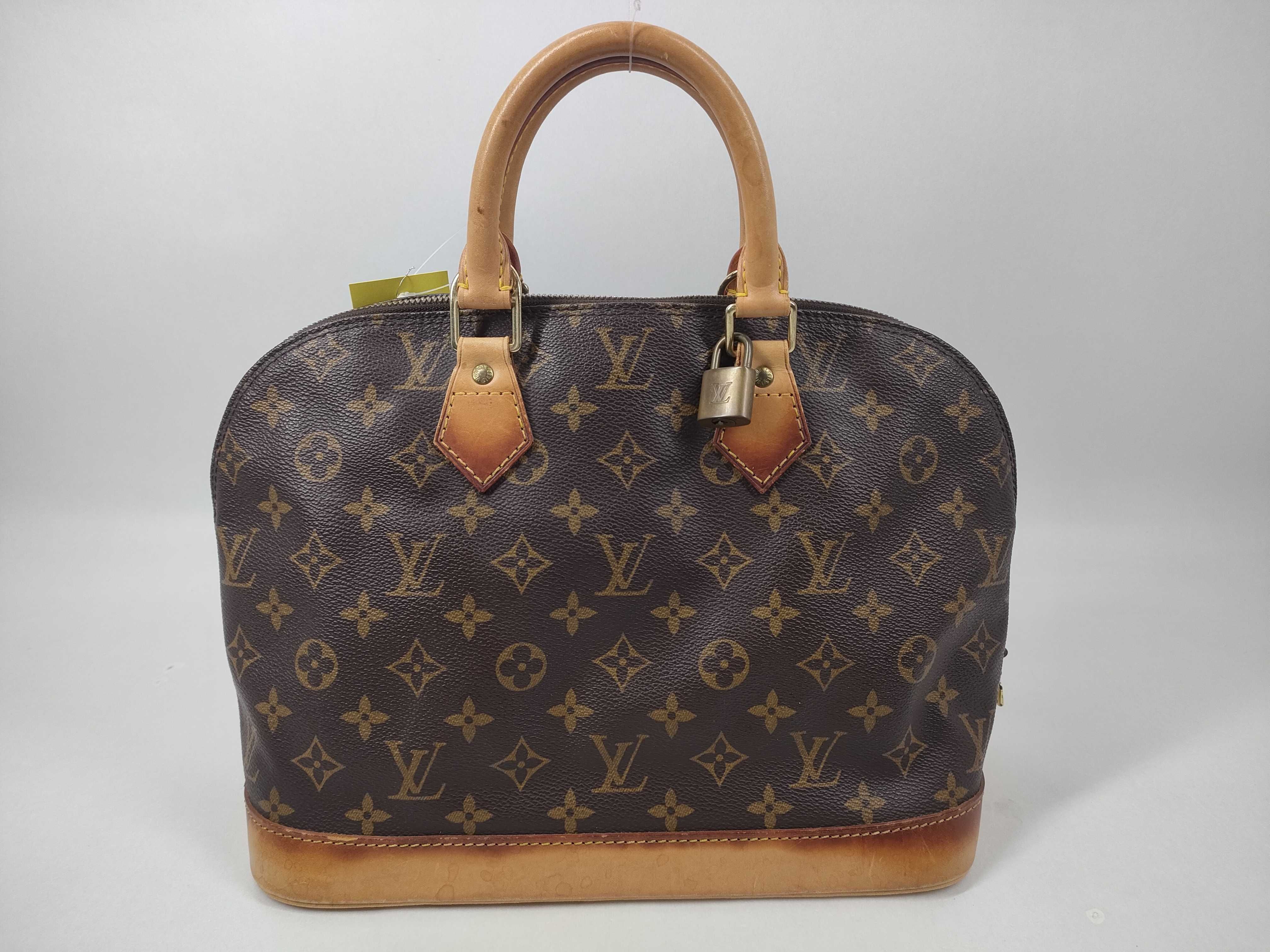 Monogram M40878 Alma MM Handbag