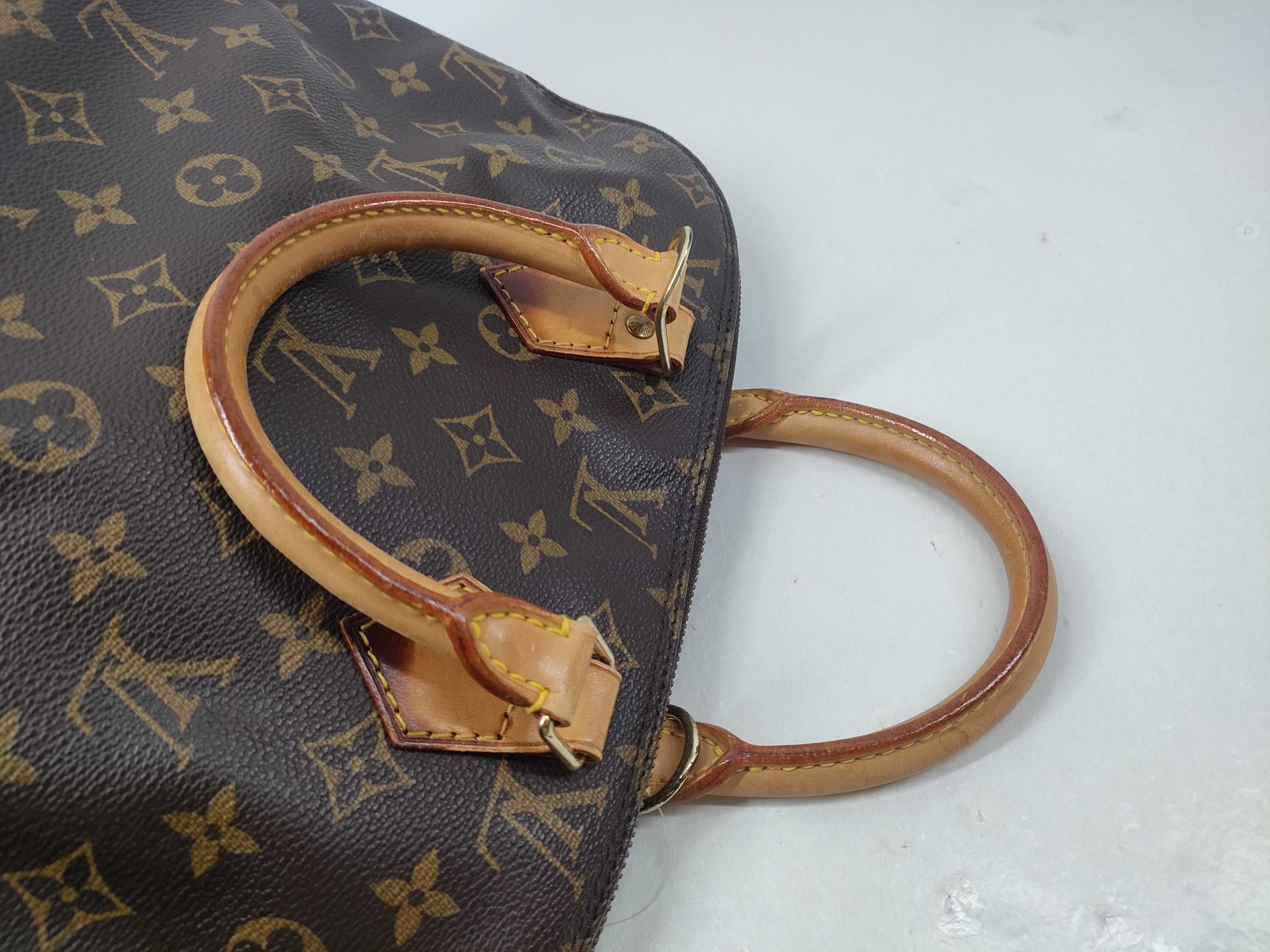 Monogram M40878 Alma MM Handbag — view 8