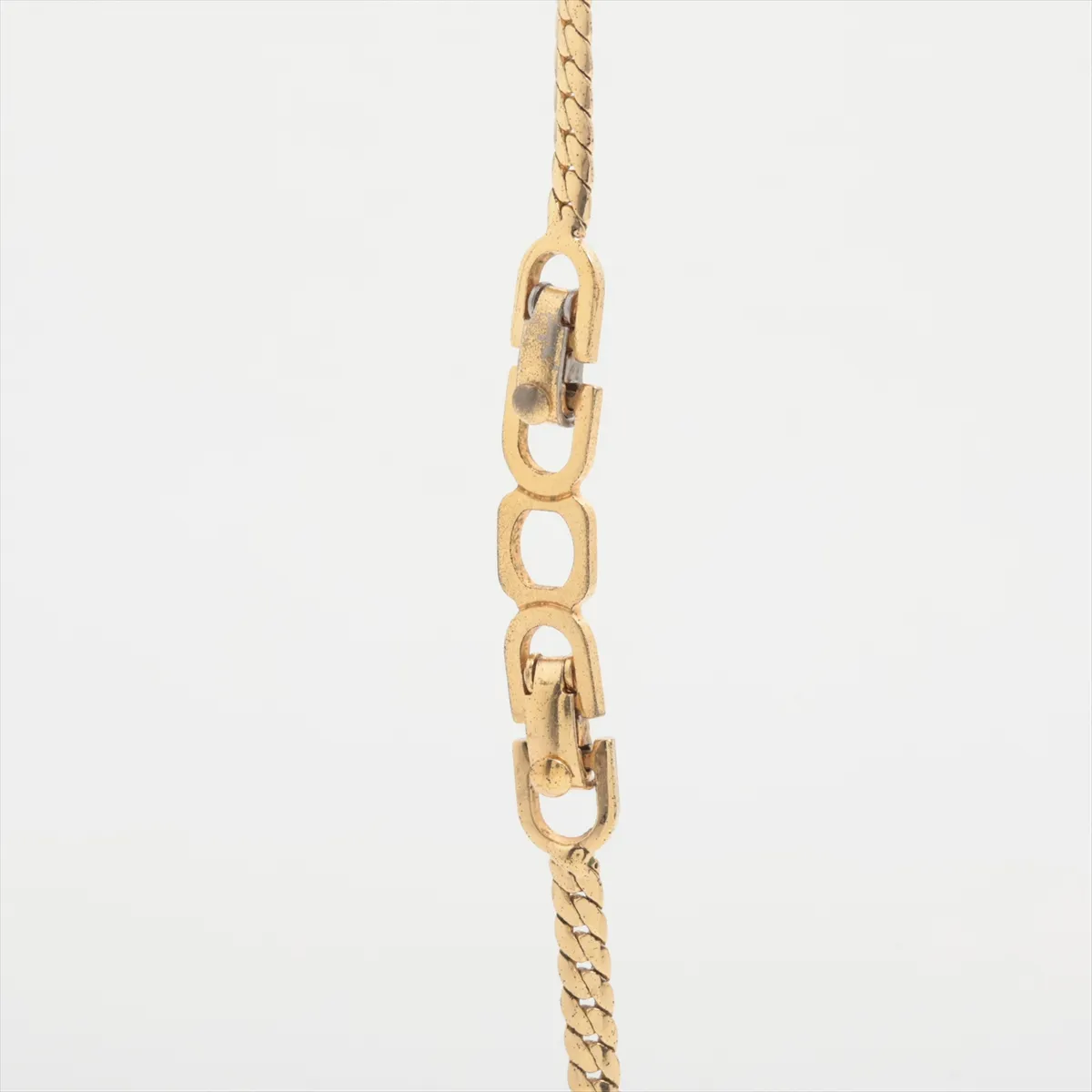 necklace, gold and black, with rhinestones. Shows signs of wear including — view 3