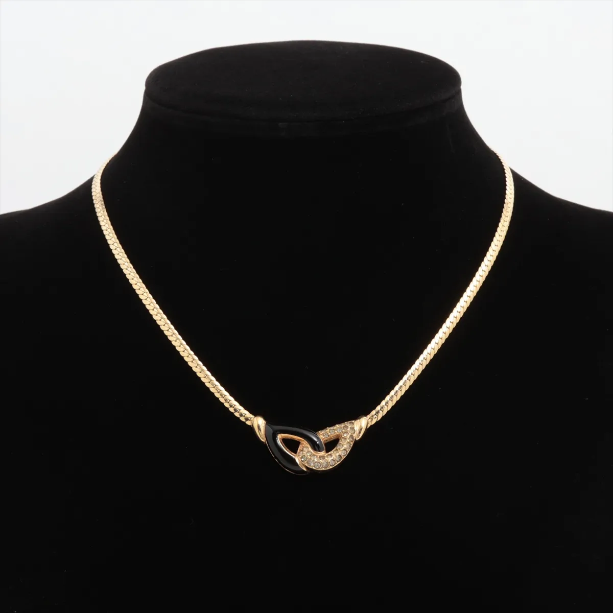 necklace, gold and black, with rhinestones. Shows signs of wear including — view 5