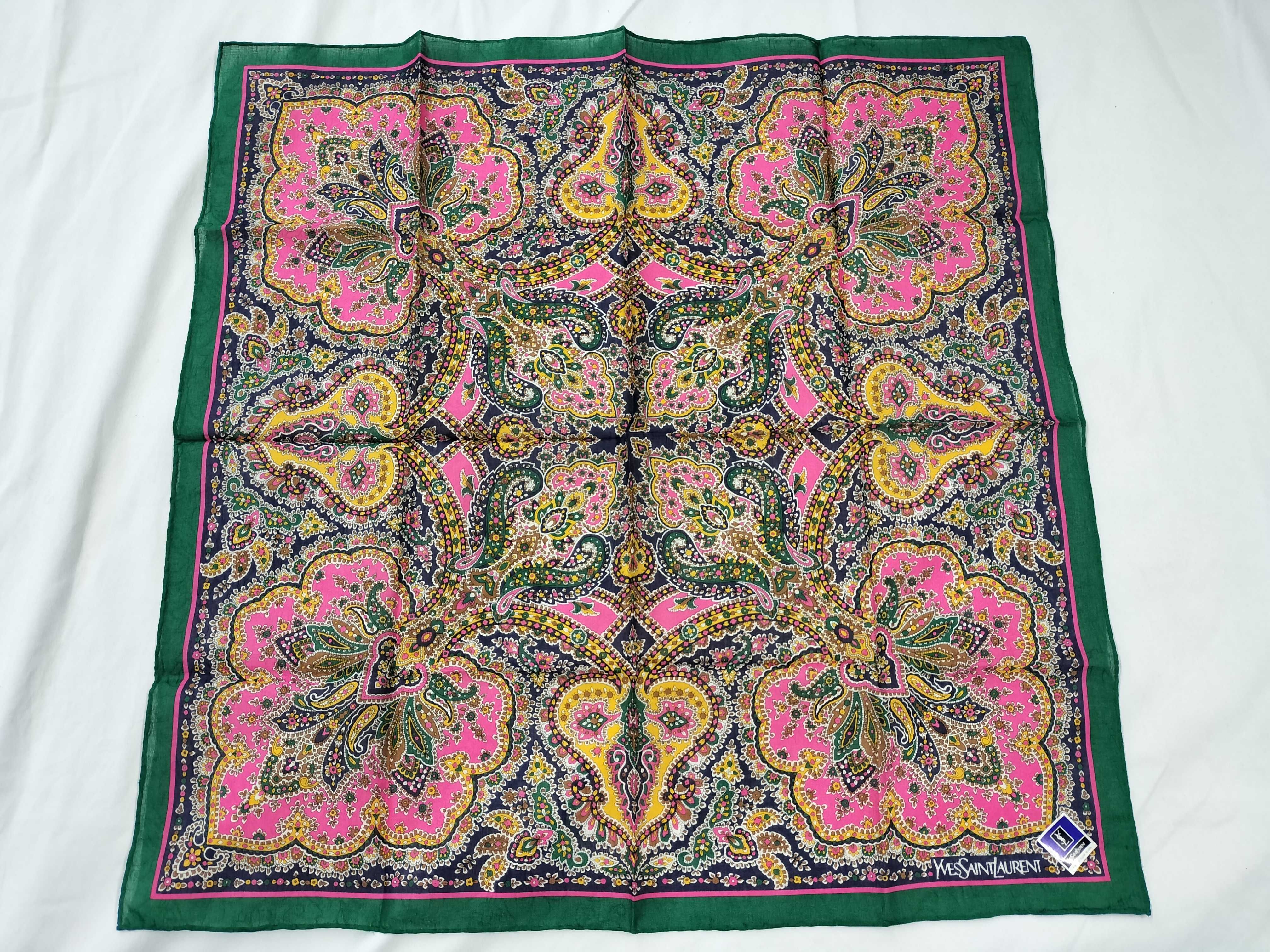 handkerchief/scarf with sticker, paisley pattern, green, and other accessories.