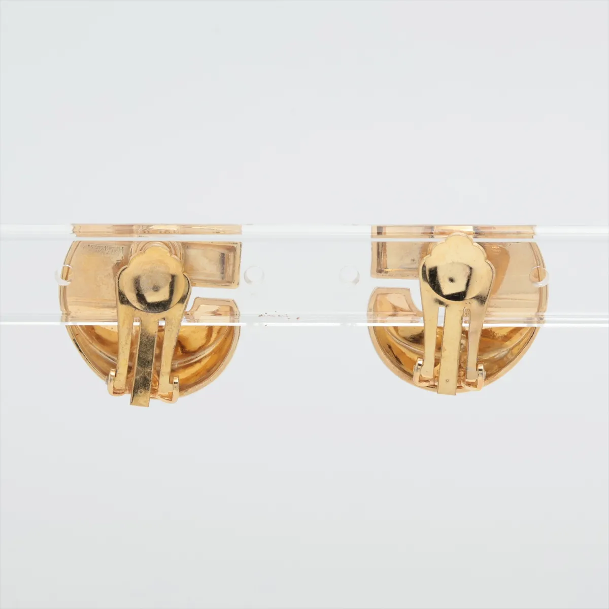 logo earrings (for both ears), GP gold. Shows signs of wear, — view 2