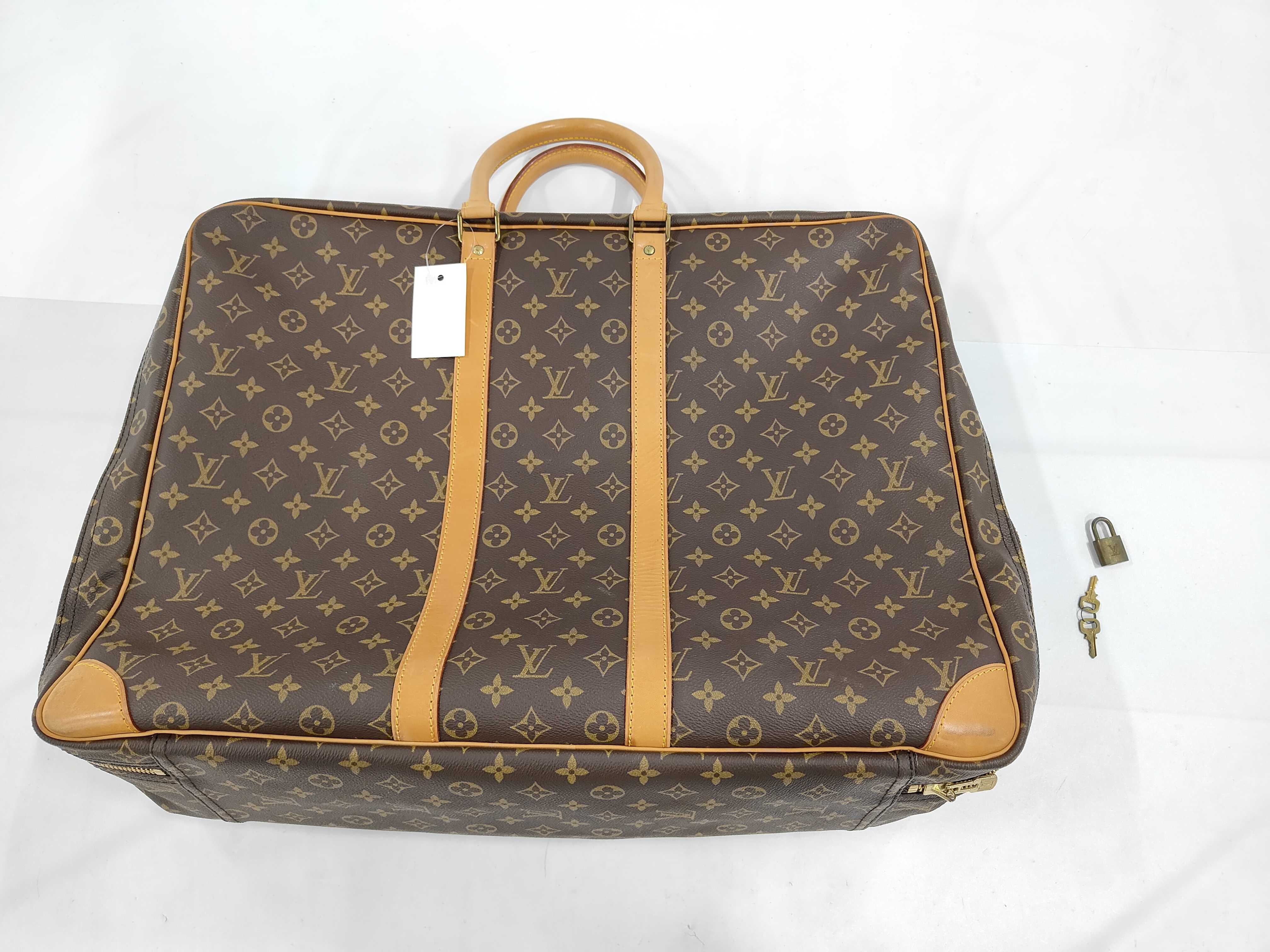 Monogram M41404 Sirius 55 Handbag