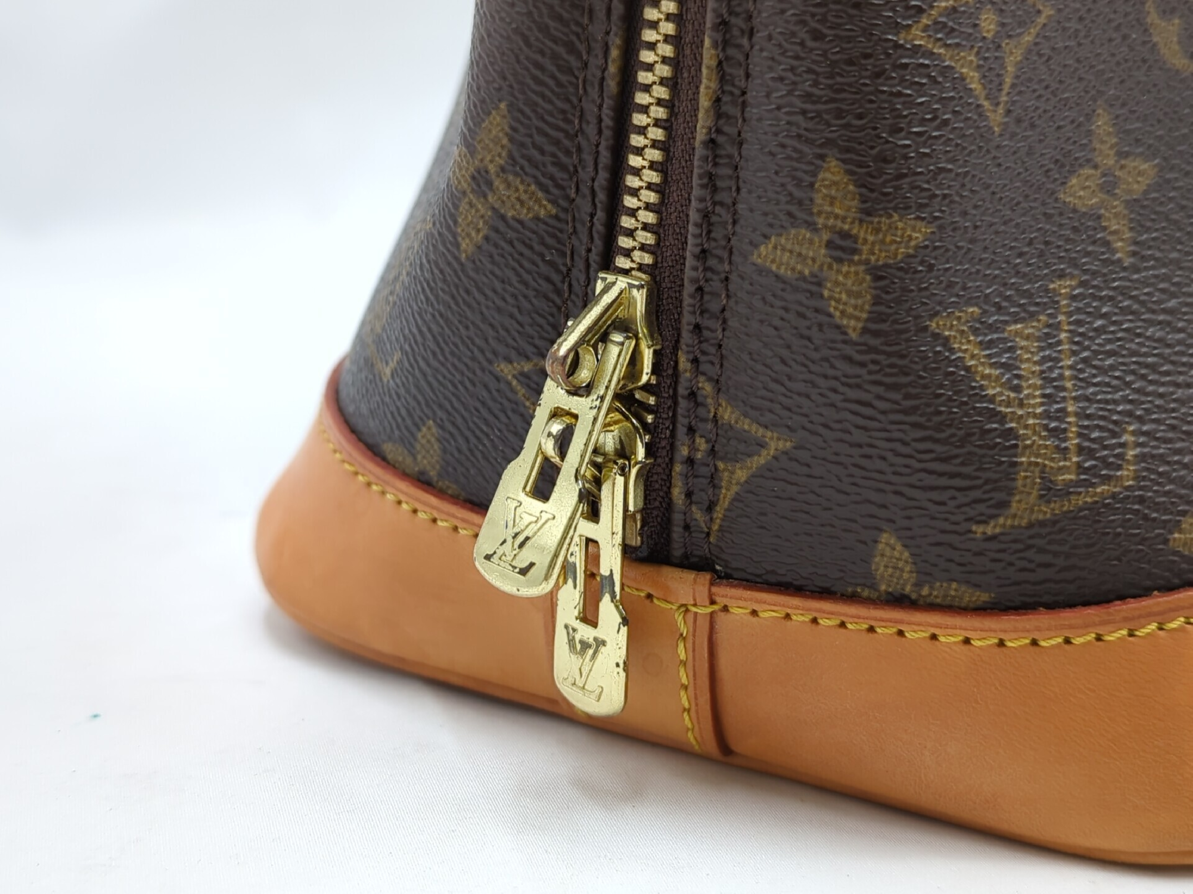 M51130 Monogram Alma Handbag — view 9