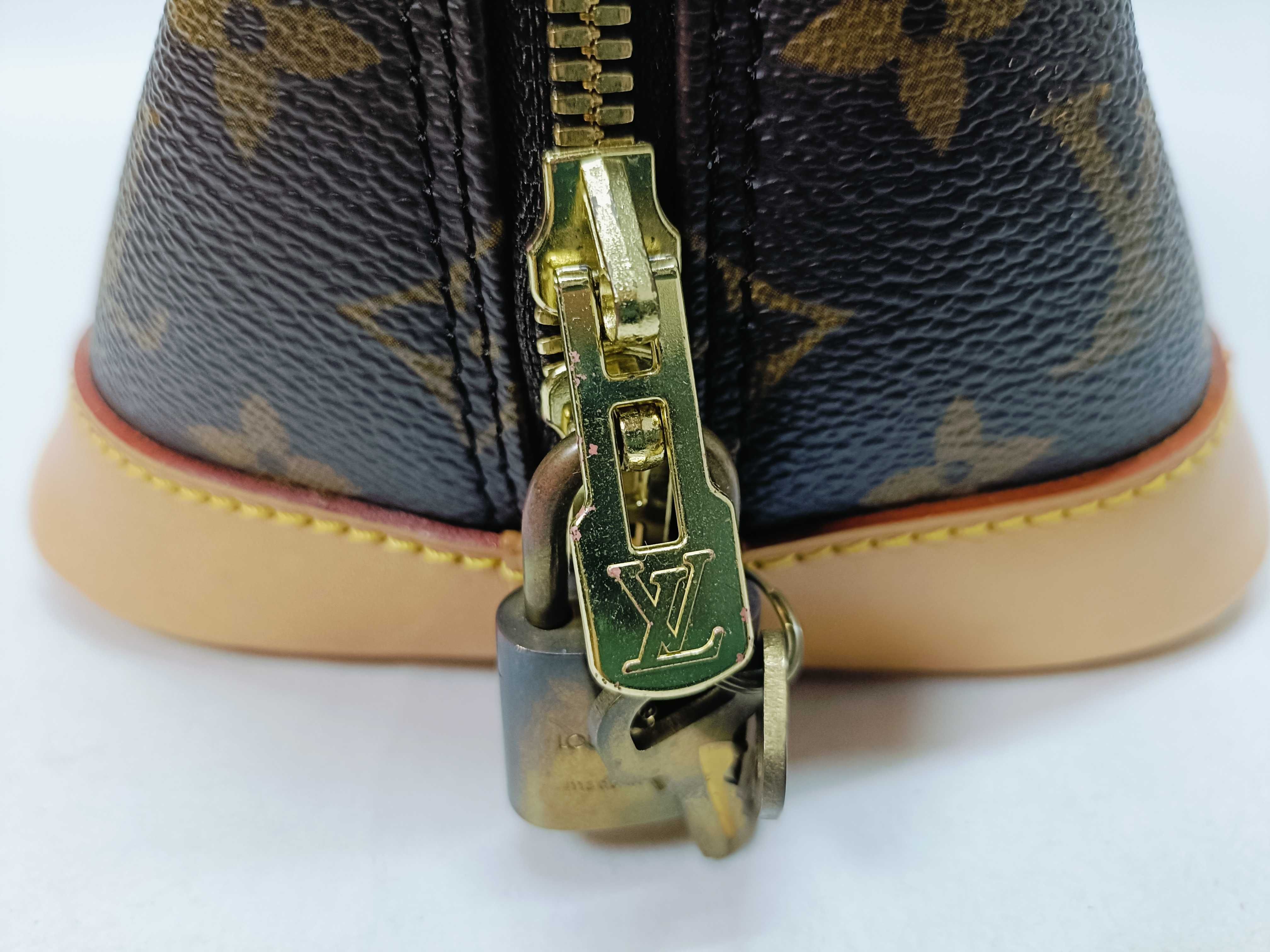 Monogram Alma M51130 Handbag — view 6