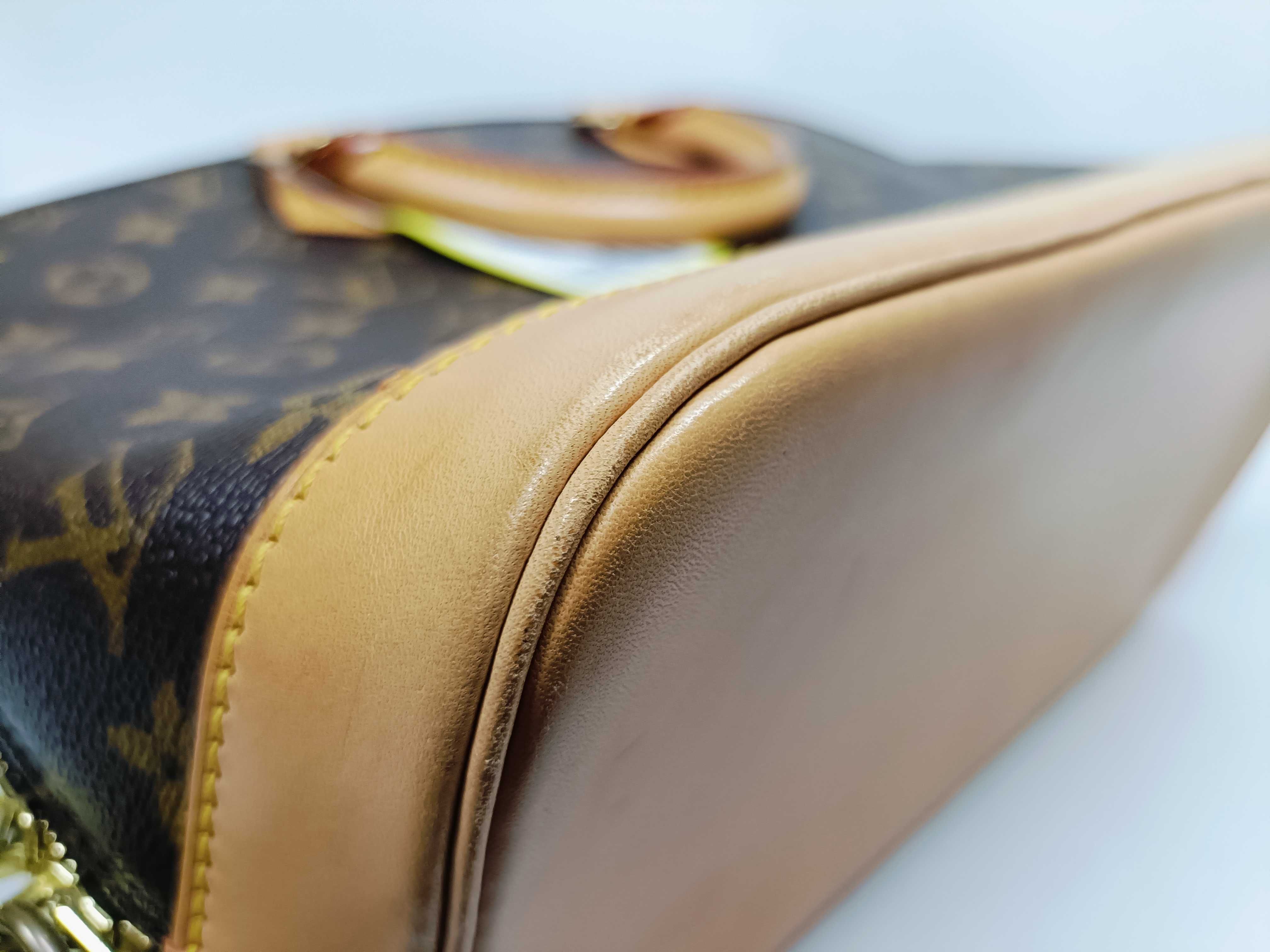 Monogram Alma M51130 Handbag — view 8