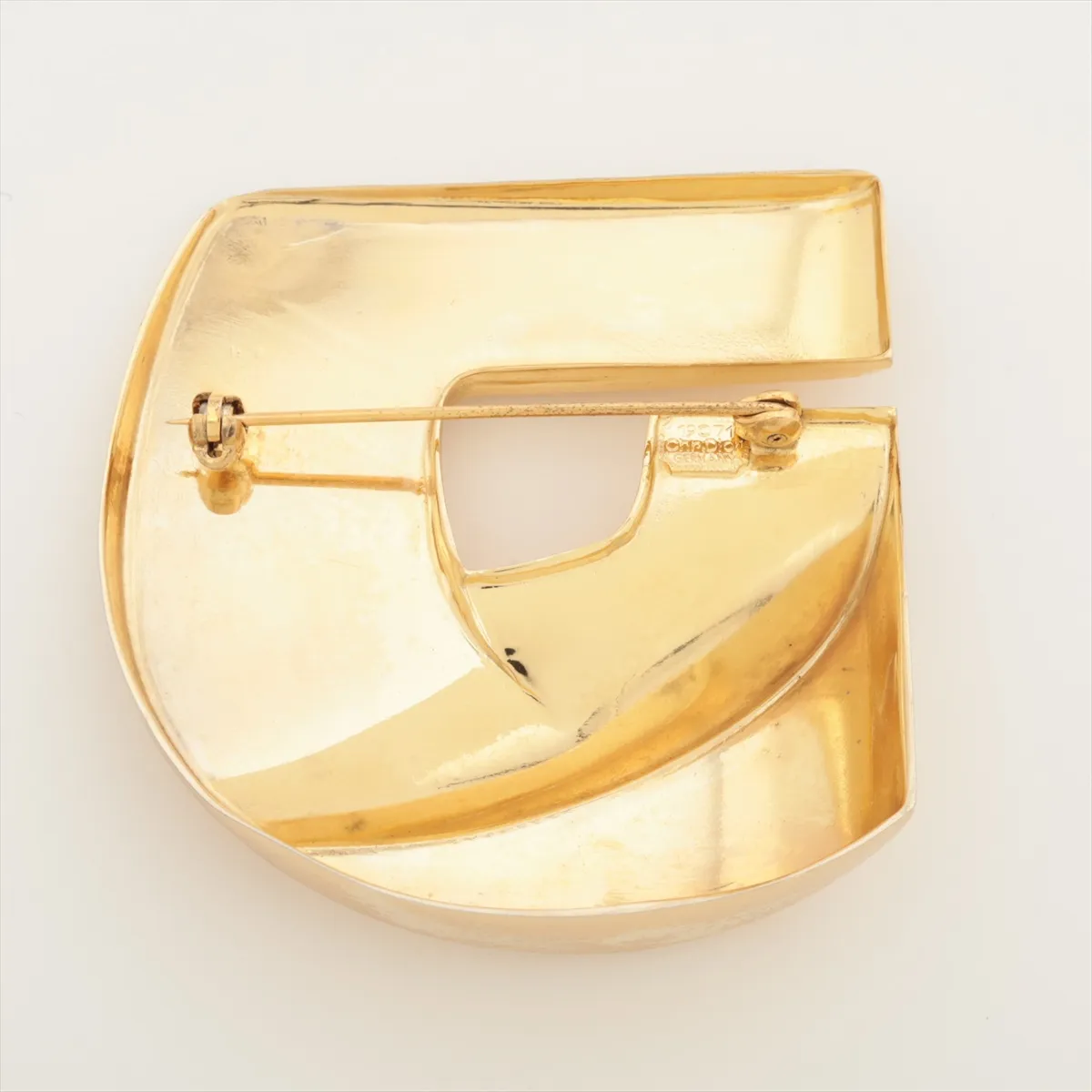logo brooch, GP gold. Shows signs of wear, including — view 2