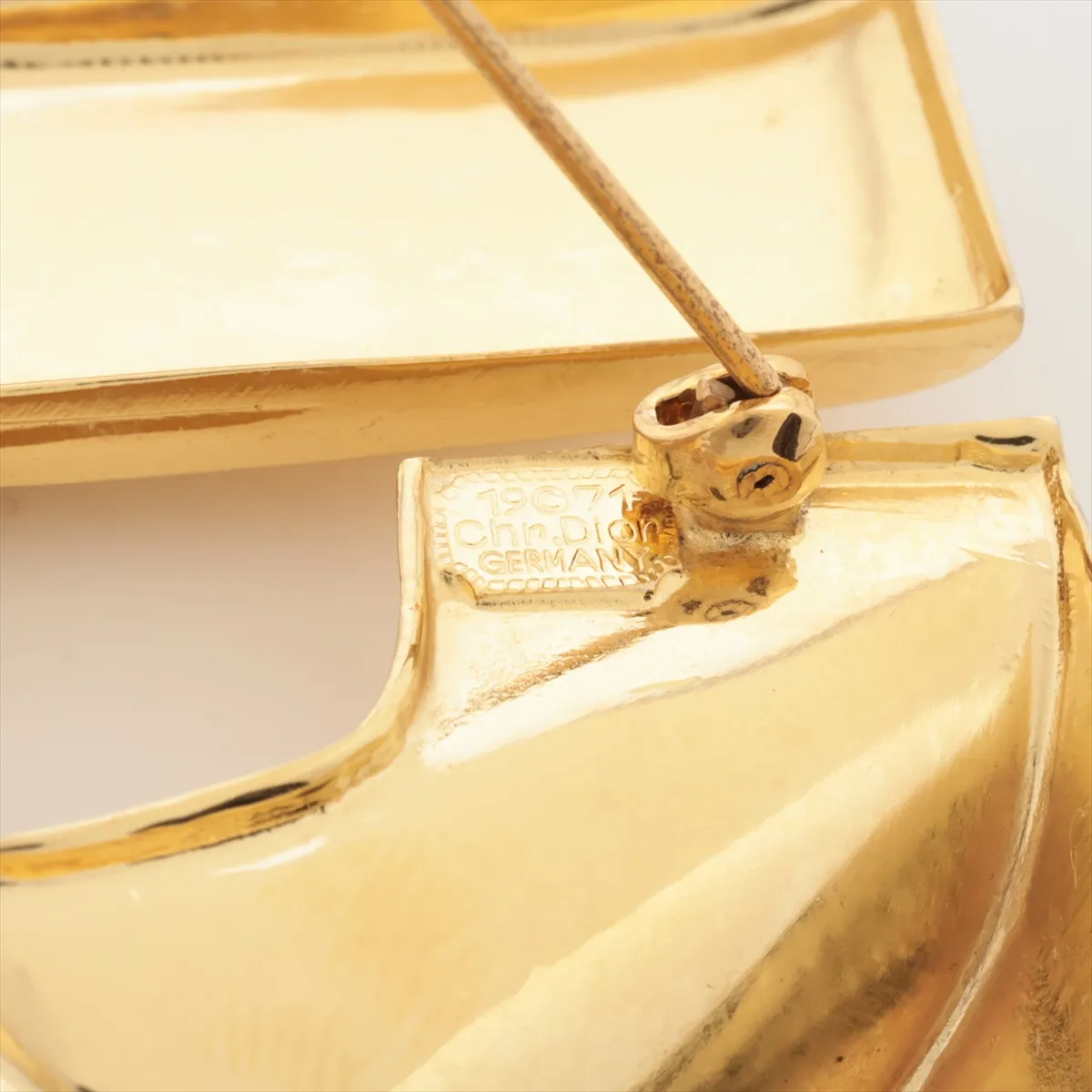 logo brooch, GP gold. Shows signs of wear, including — view 4