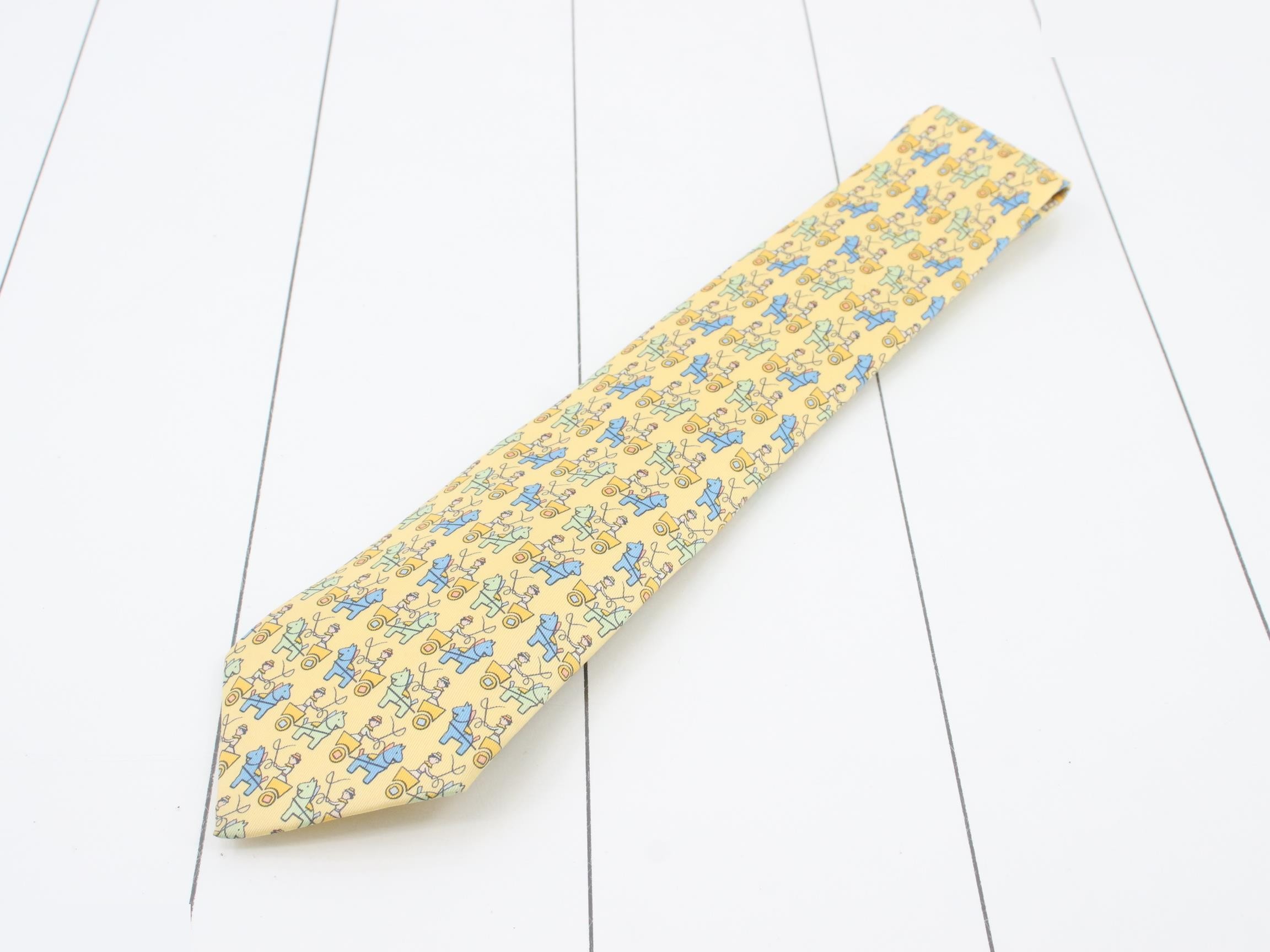 Hermès silk tie with Haniwa (clay figure) design