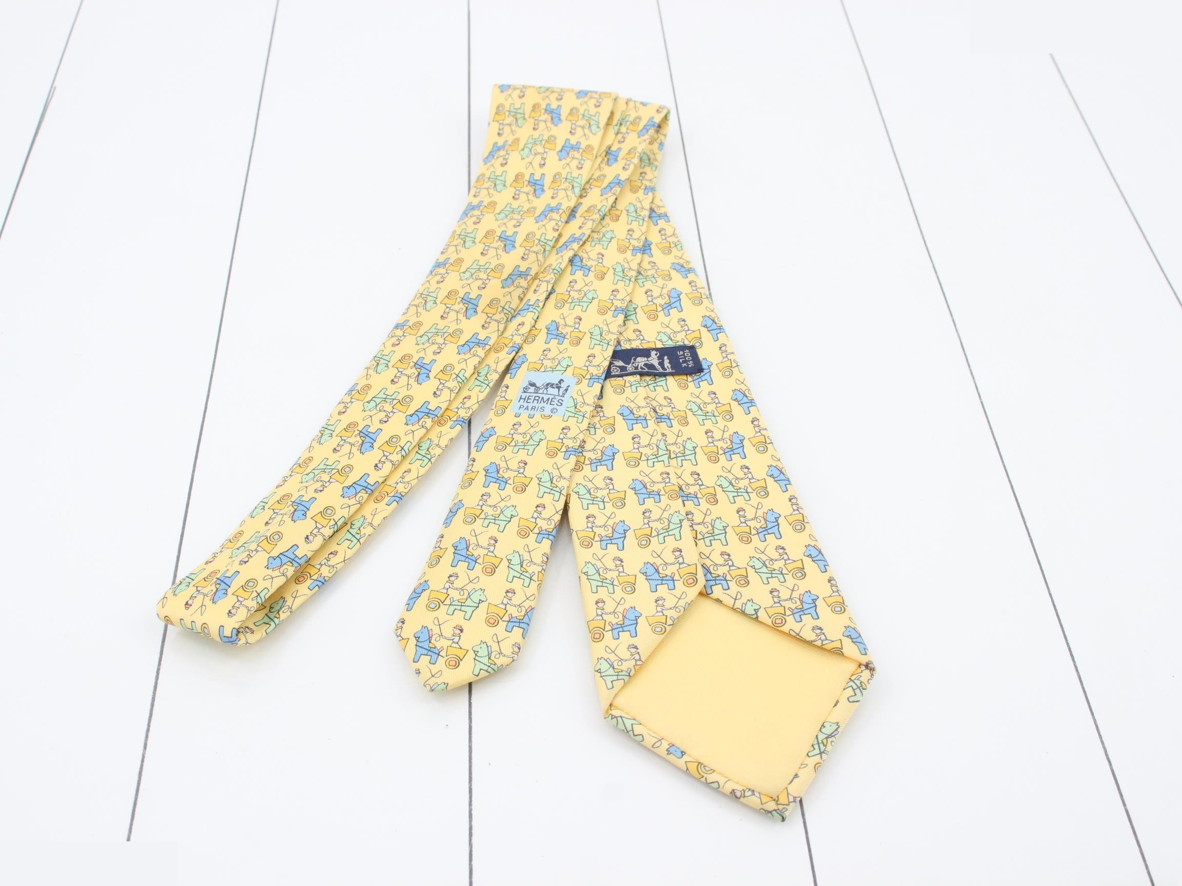Hermès silk tie with Haniwa (clay figure) design — view 2