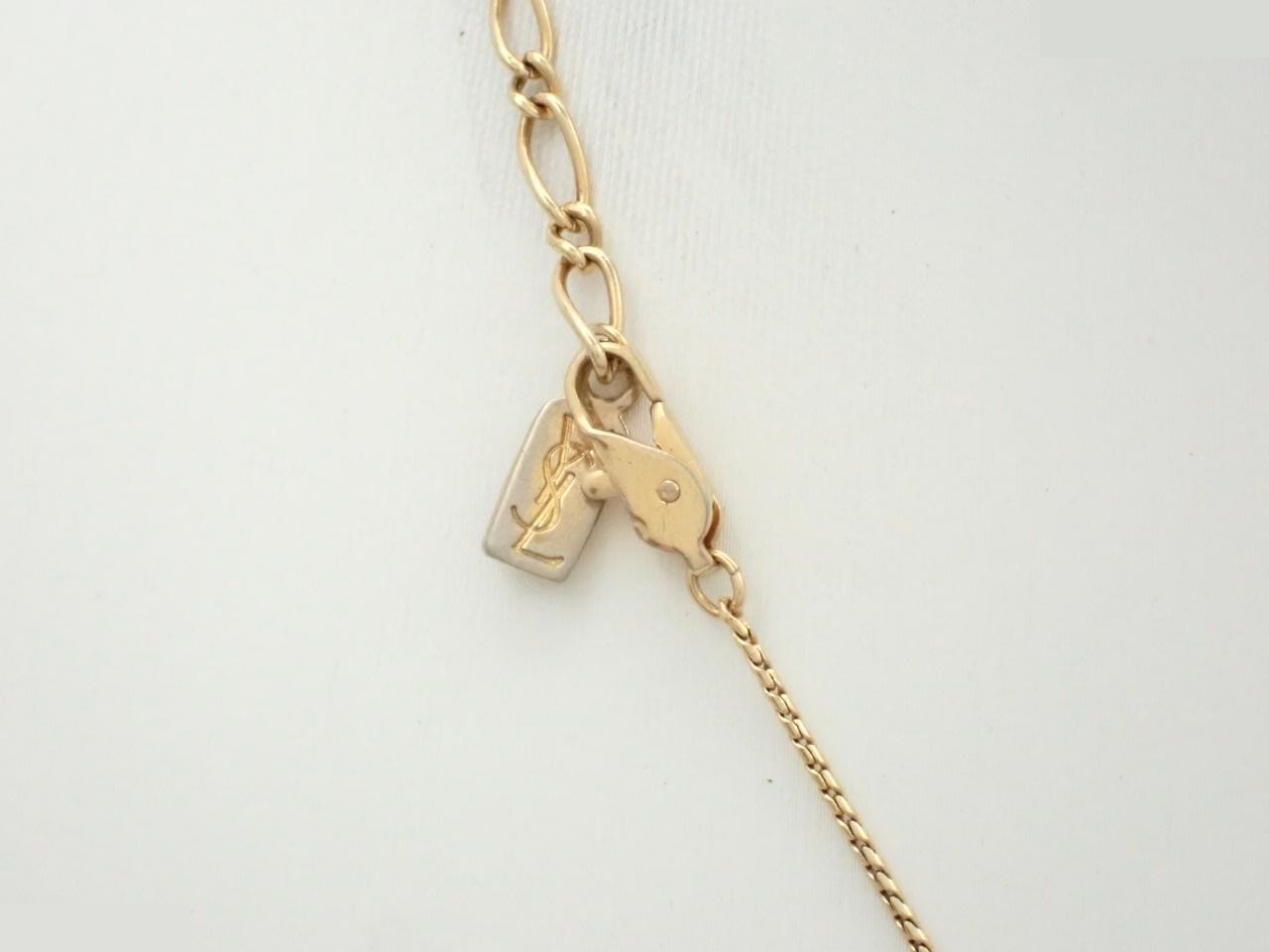 Other lines: Precious metals/necklaces, logo, circle, gold. — view 2
