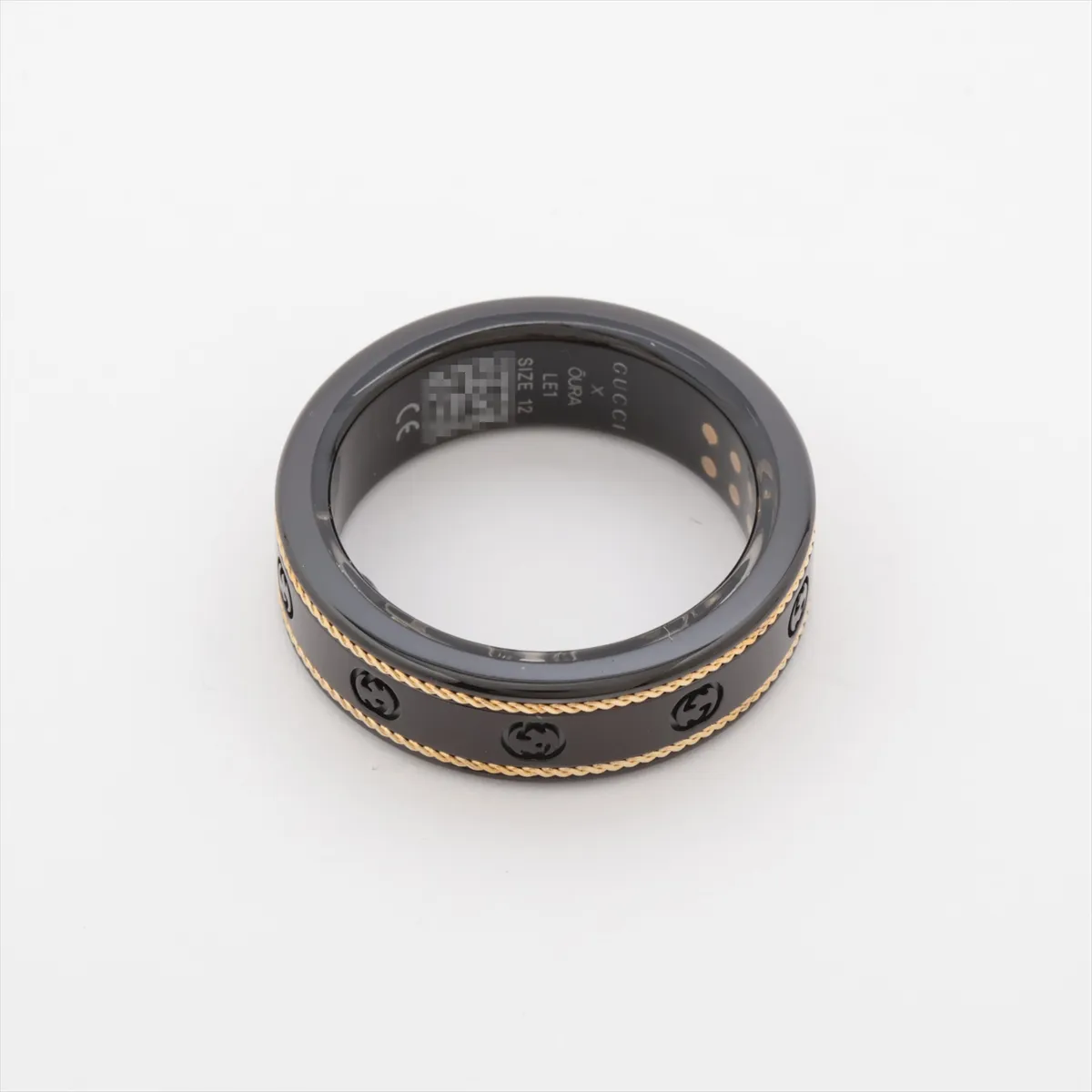x Aura Interlocking G Ring, Size 12, Titanium, Black x Gold. Shows — view 2