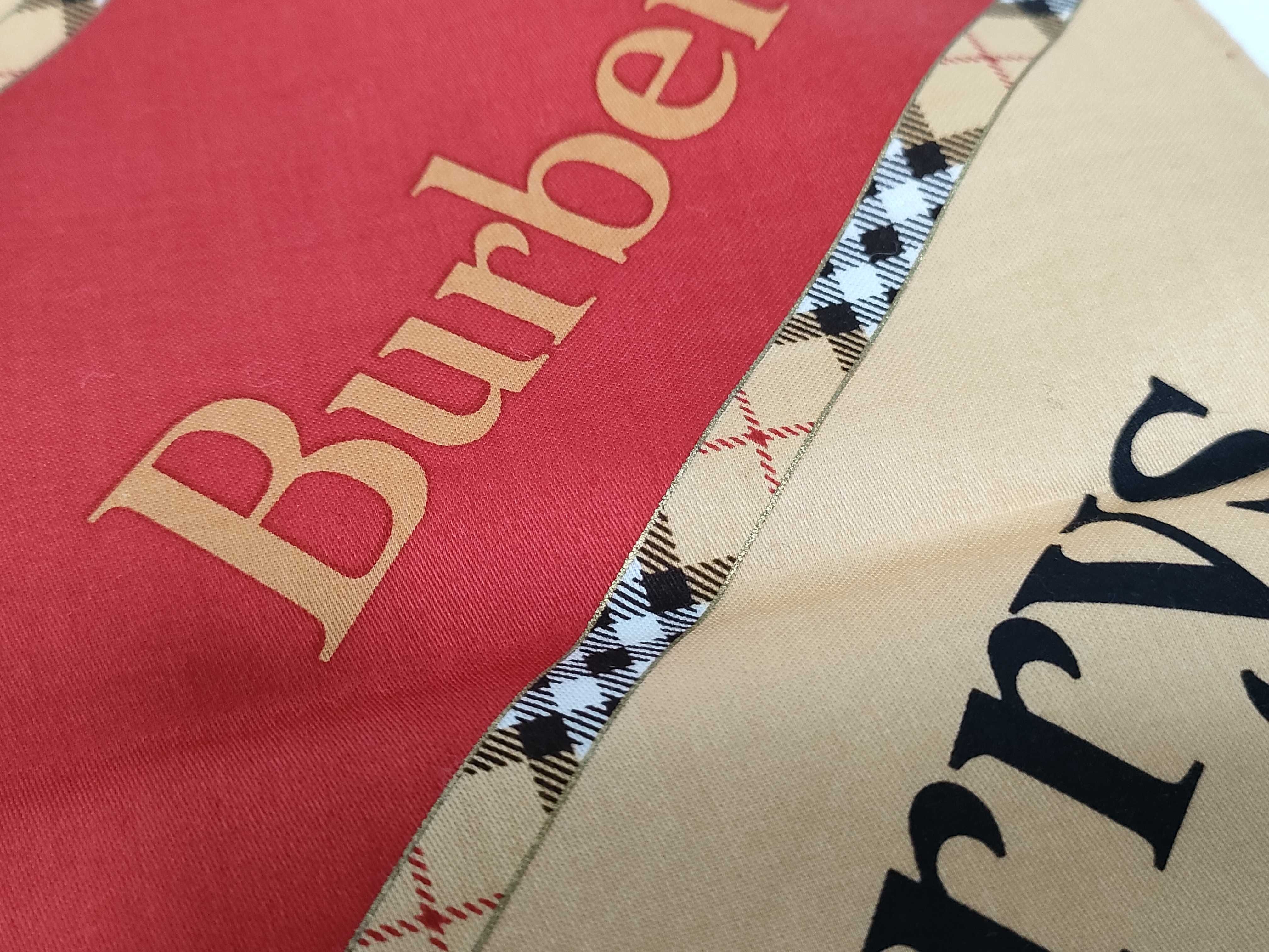 handkerchief/scarf with sticker, logo print, beige/red, and other accessories. — view 6
