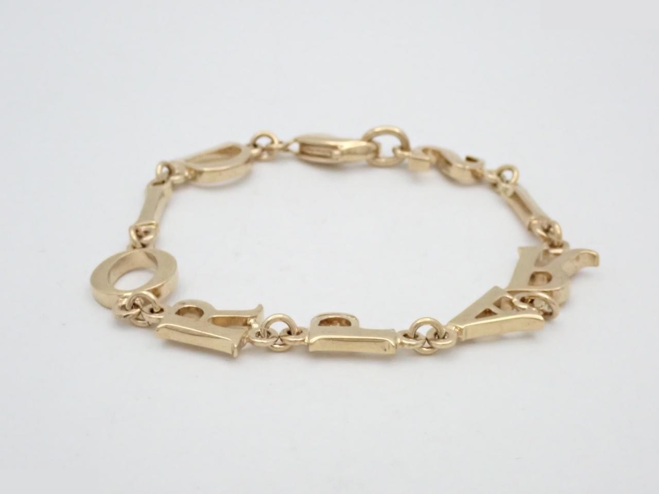 Comes with box. Gold bracelet. Wrist size approximately 19cm.