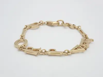 Comes with box. Gold bracelet. Wrist size approximately 19cm.
