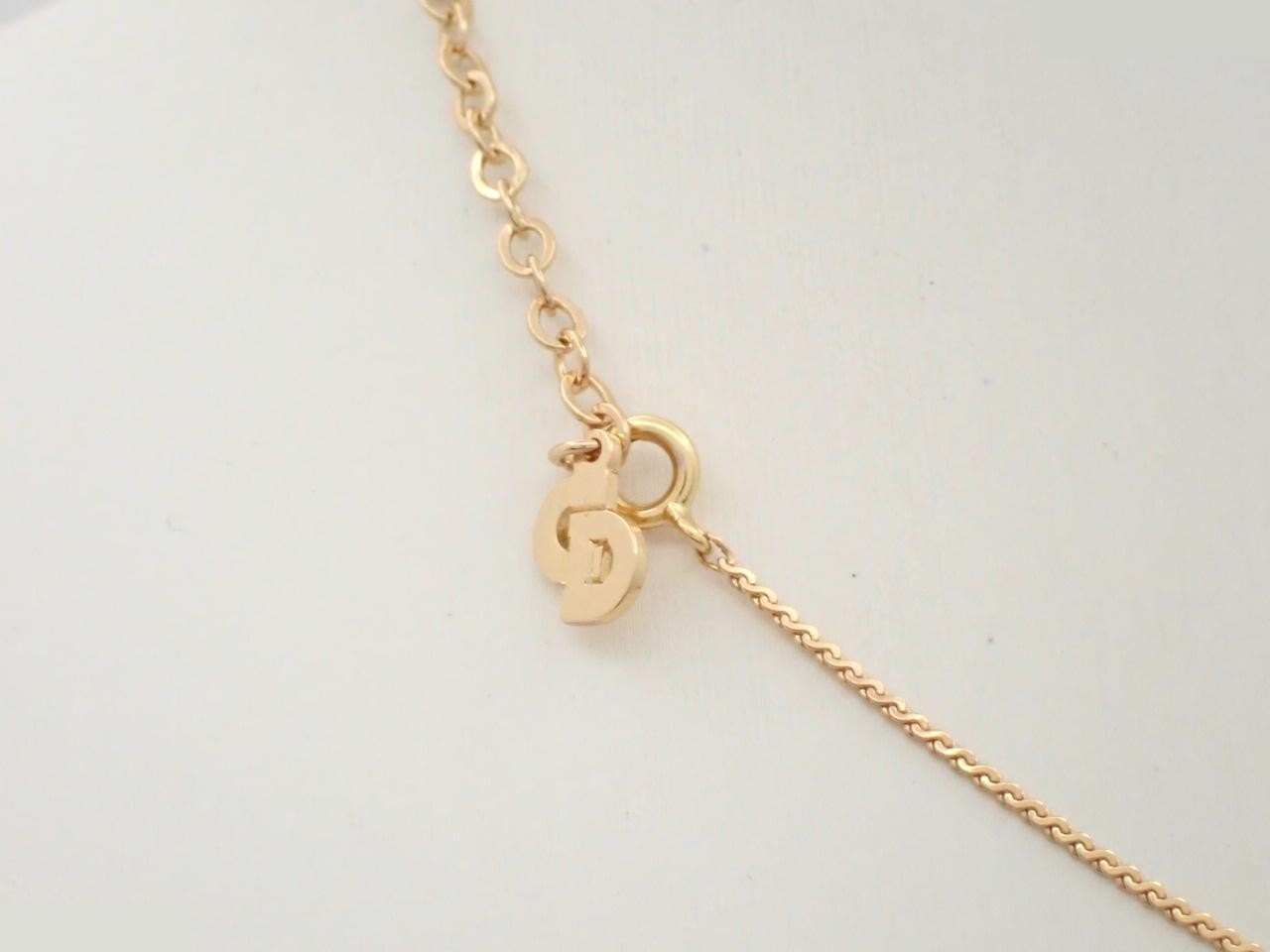 CD logo, other lines, precious metals, necklaces, pendants — view 2