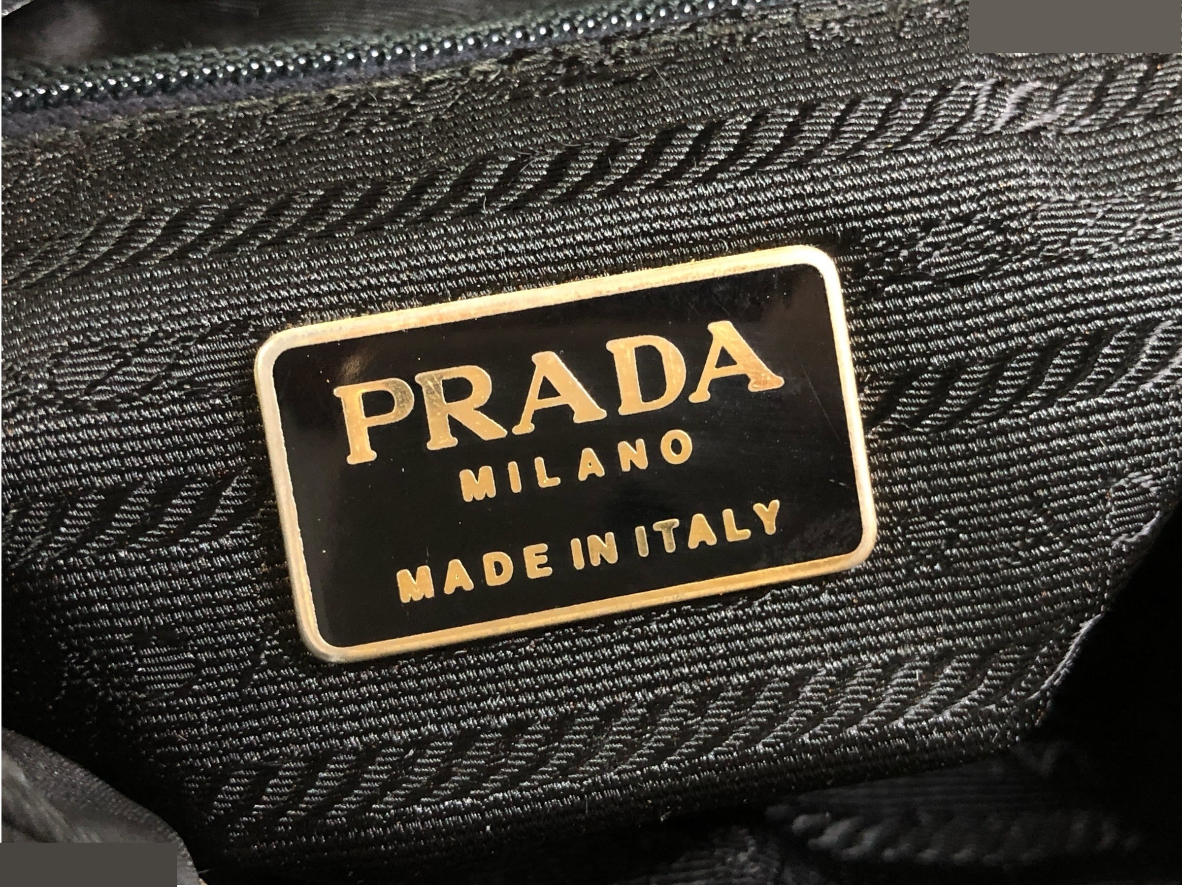 drawstring shoulder bag with triangular logo plate and crocodile embossed leather. — view 11