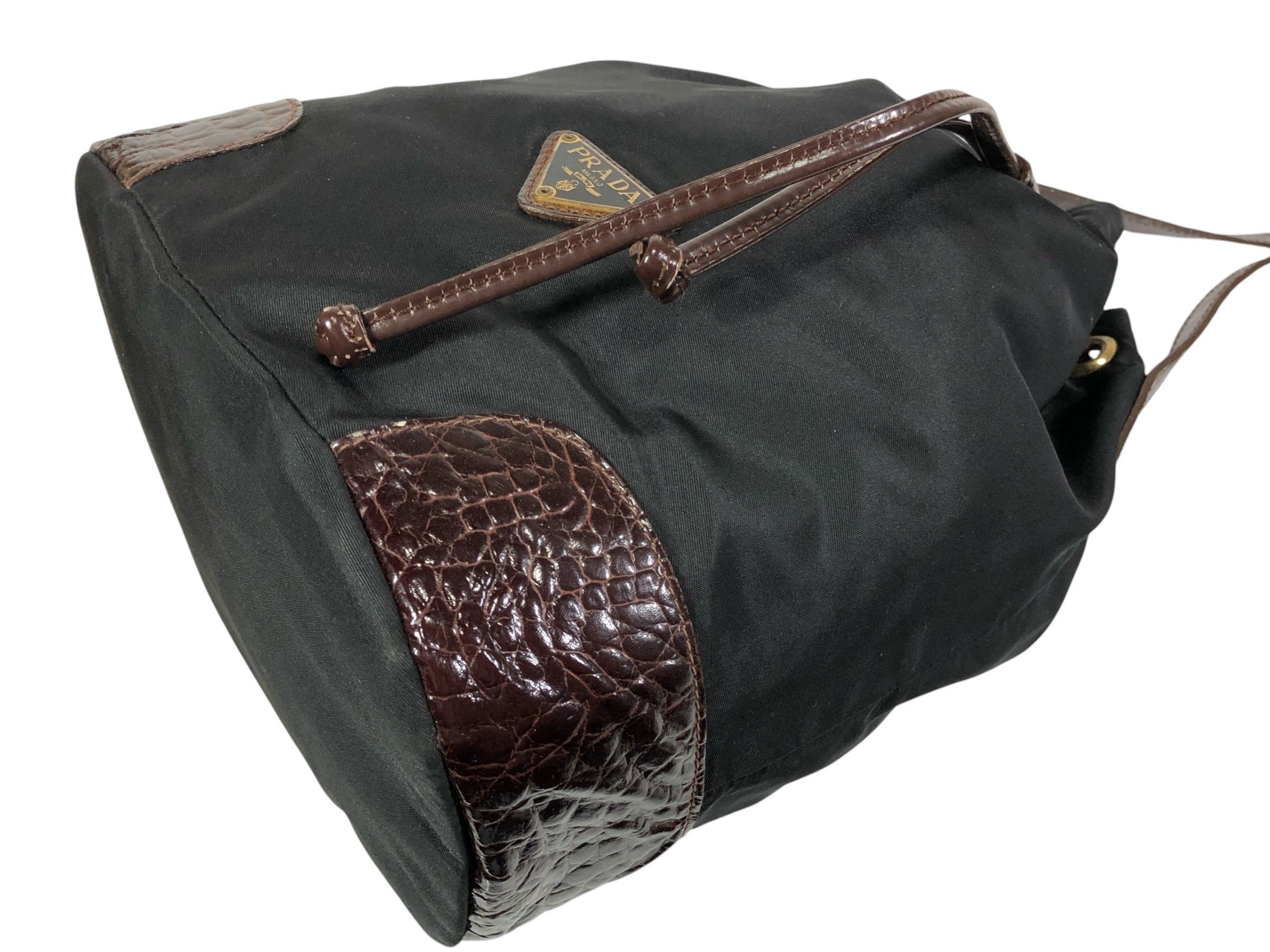 drawstring shoulder bag with triangular logo plate and crocodile embossed leather. — view 6