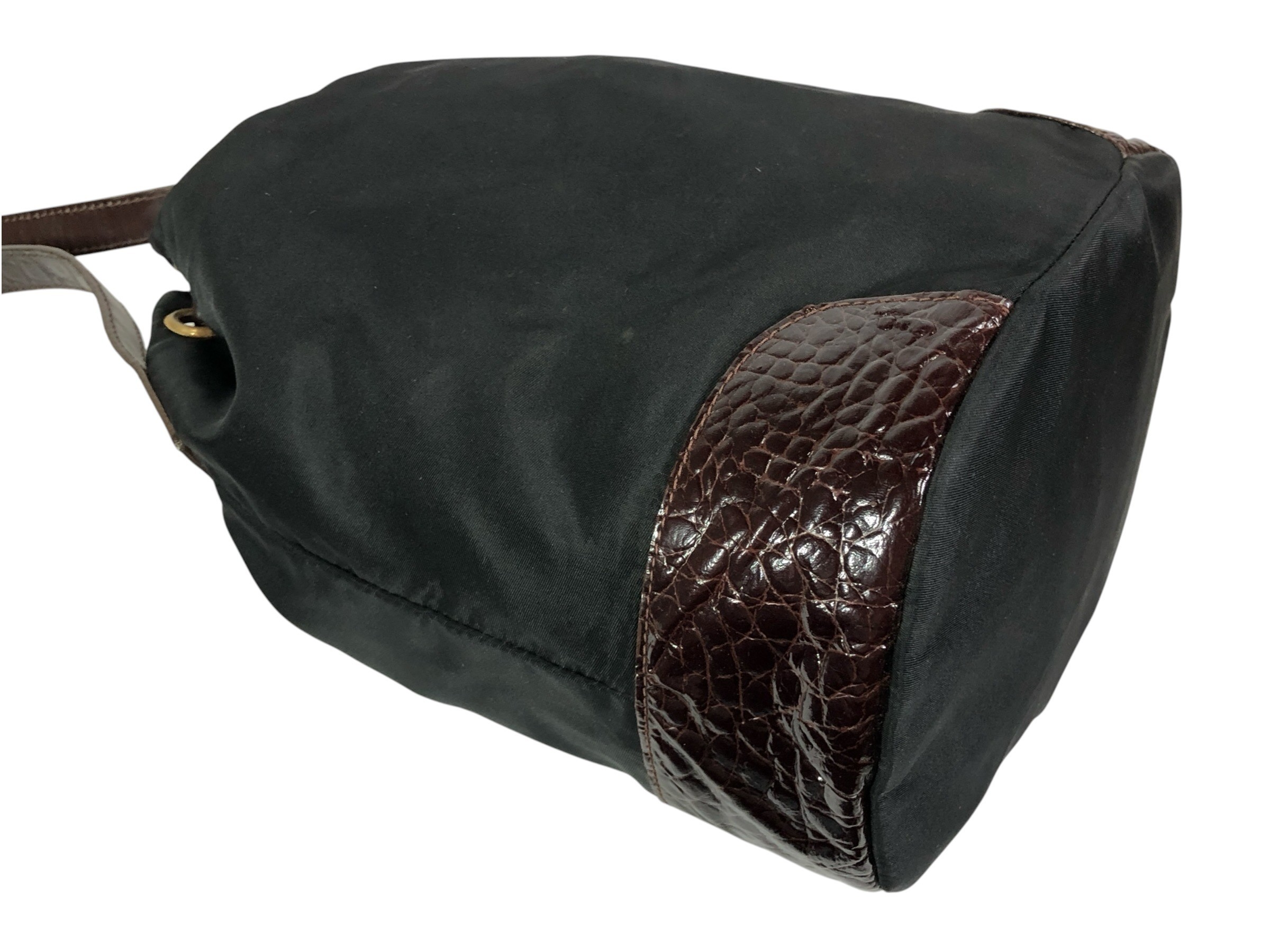 drawstring shoulder bag with triangular logo plate and crocodile embossed leather. — view 8