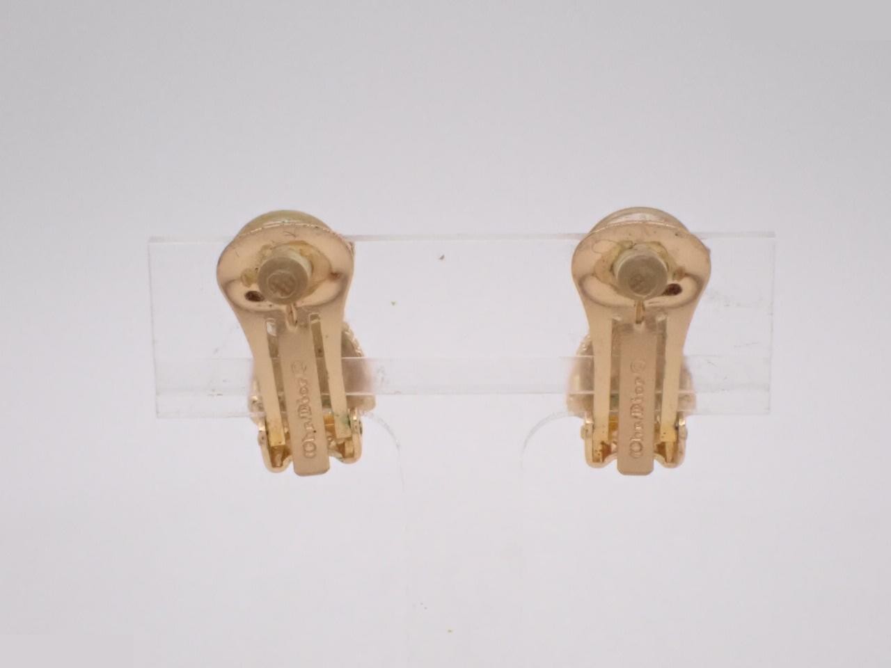 Other line: Precious metal earrings, 9.0g, rust present. — view 2
