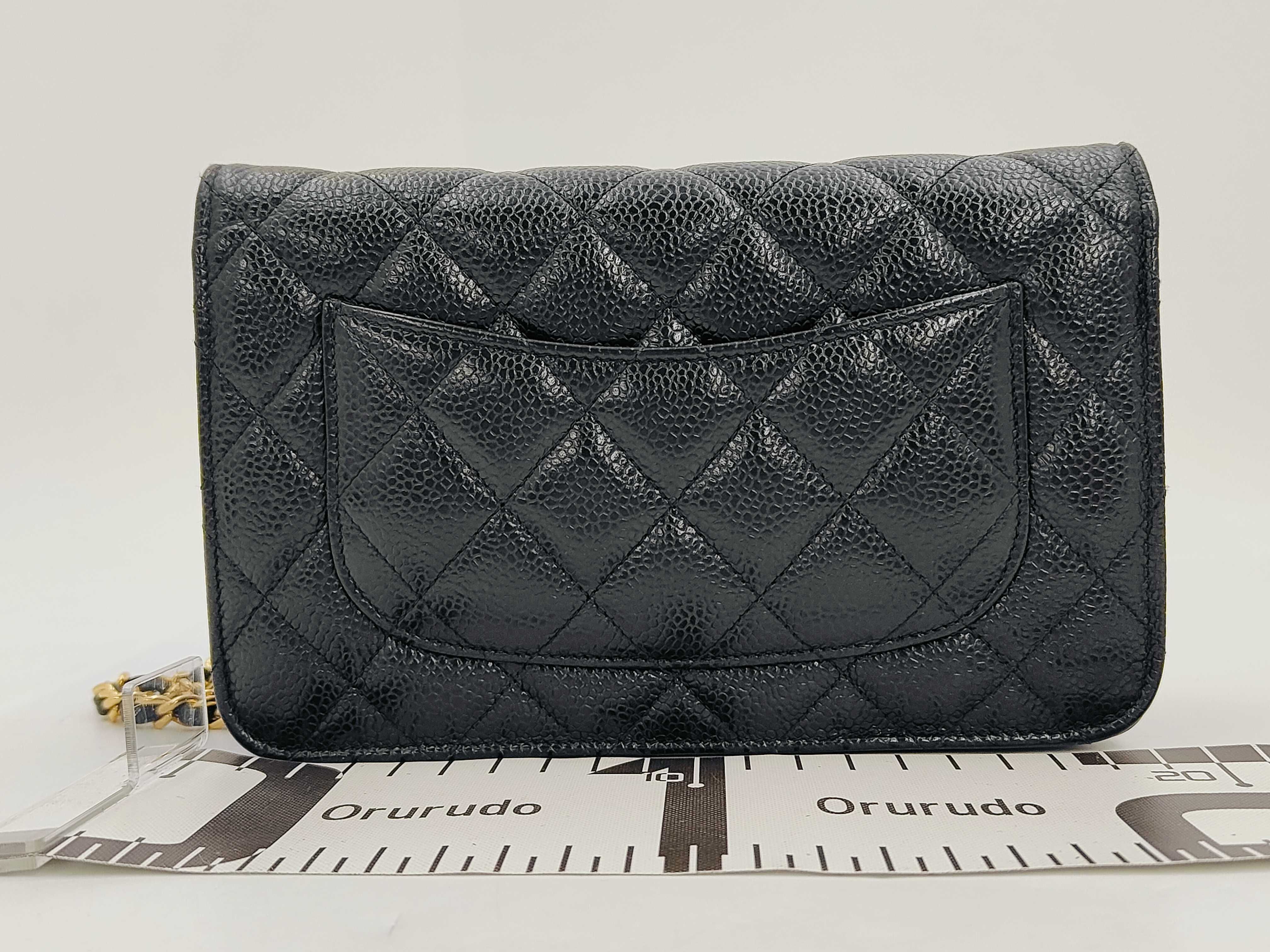 WOC Black Calfskin Medium Shoulder Bag with Gold Hardware and Embossed Chip Design — view 2