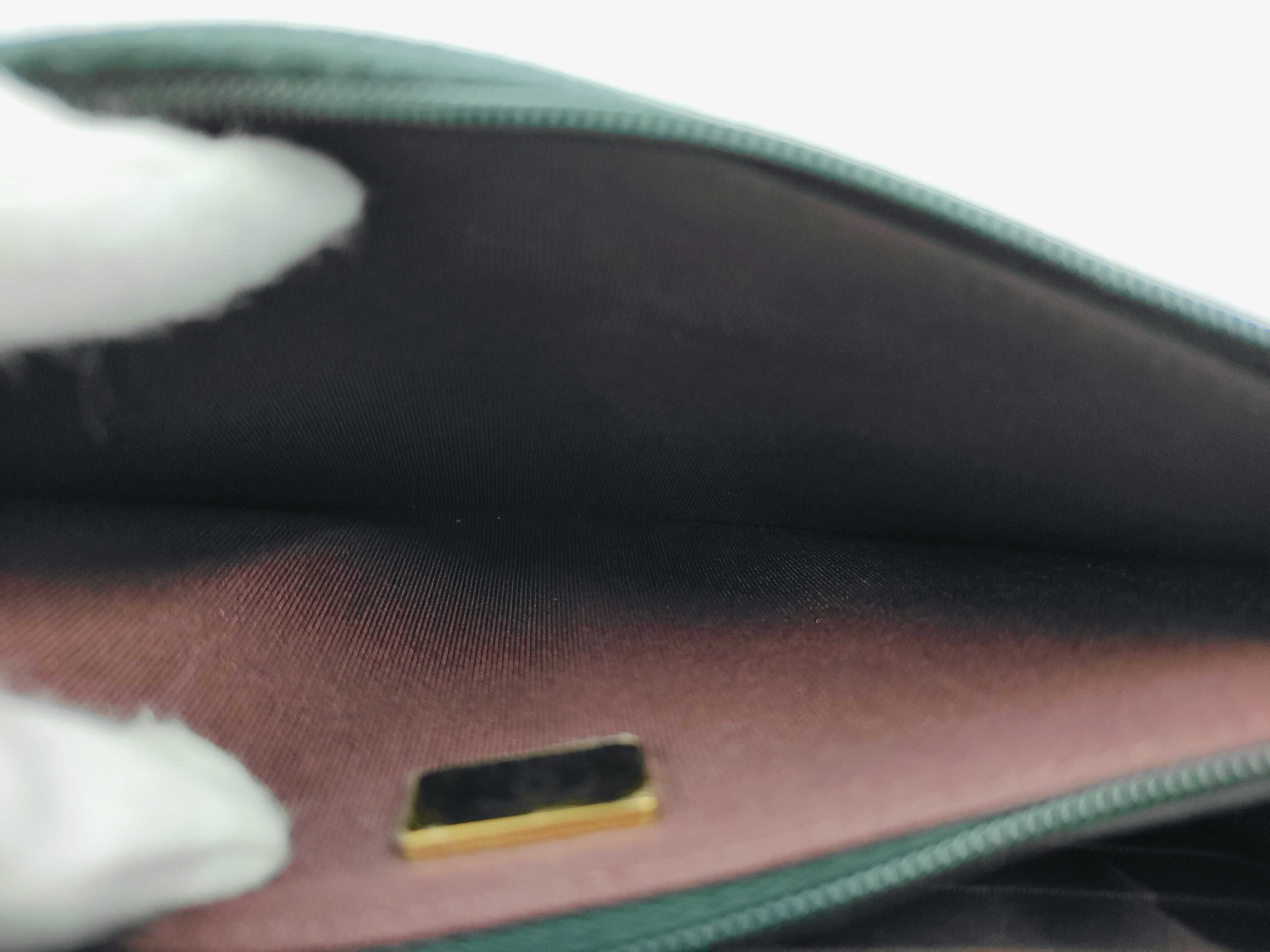 WOC Black Calfskin Medium Shoulder Bag with Gold Hardware and Embossed Chip Design — view 9