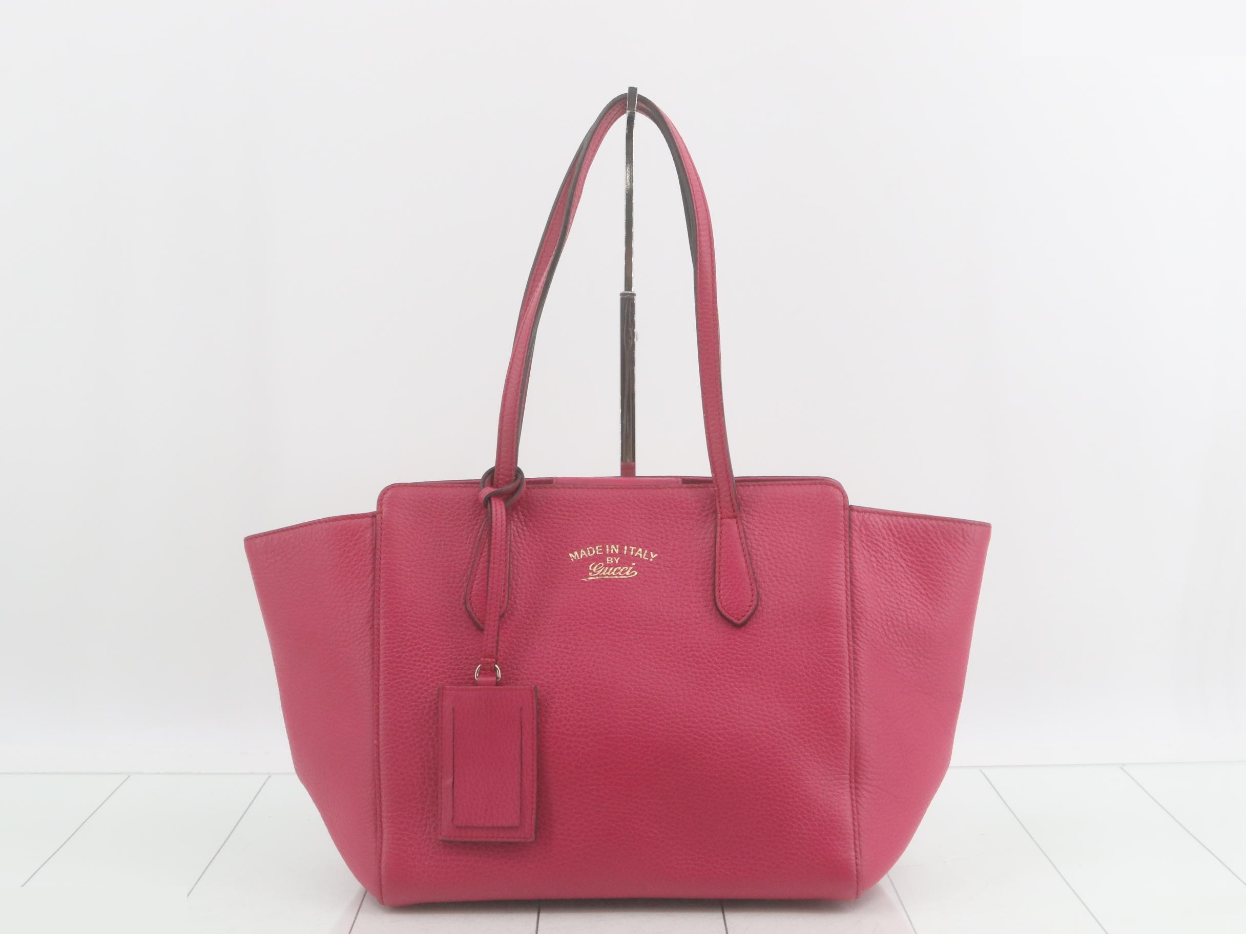 Pink leather handbag