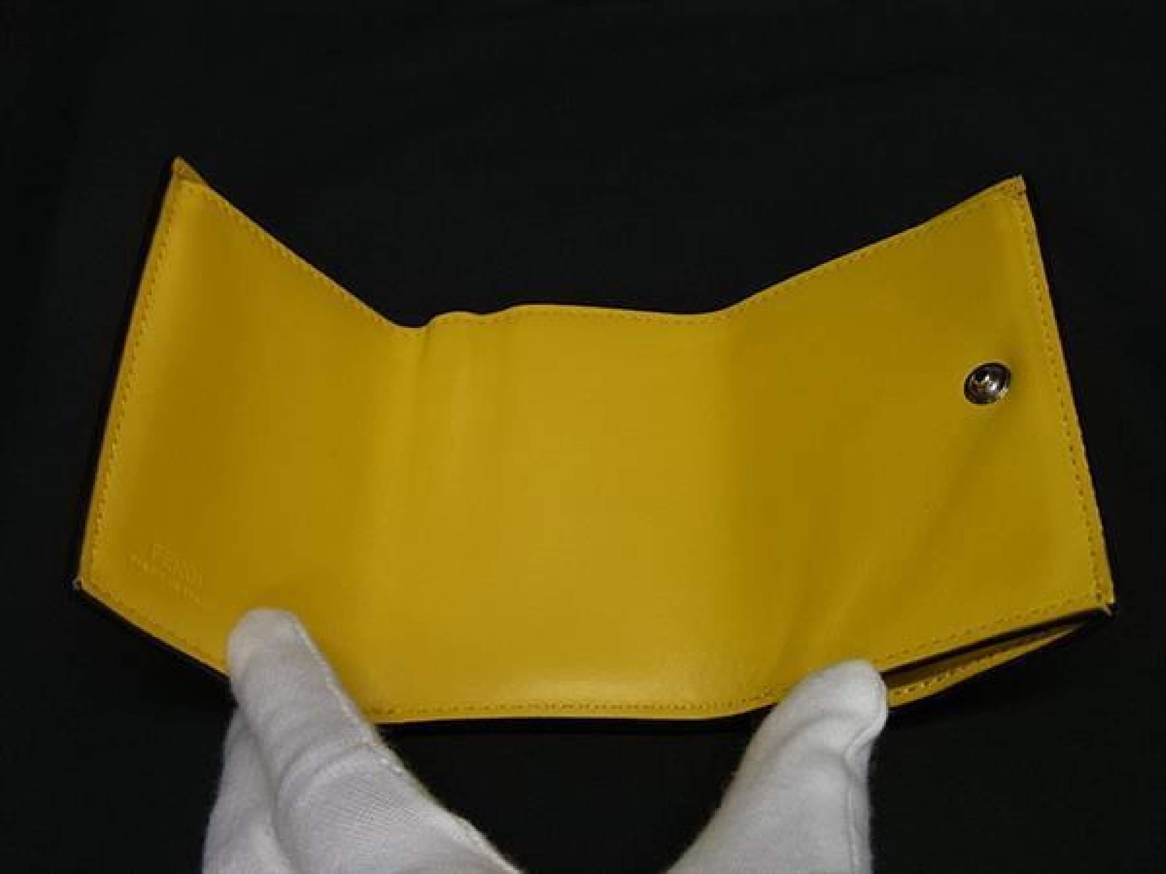 Zucca pattern F is leather trifold wallet with coin purse, bill compartment, and card slots, yellow and brown tones, HD0312. — view 4