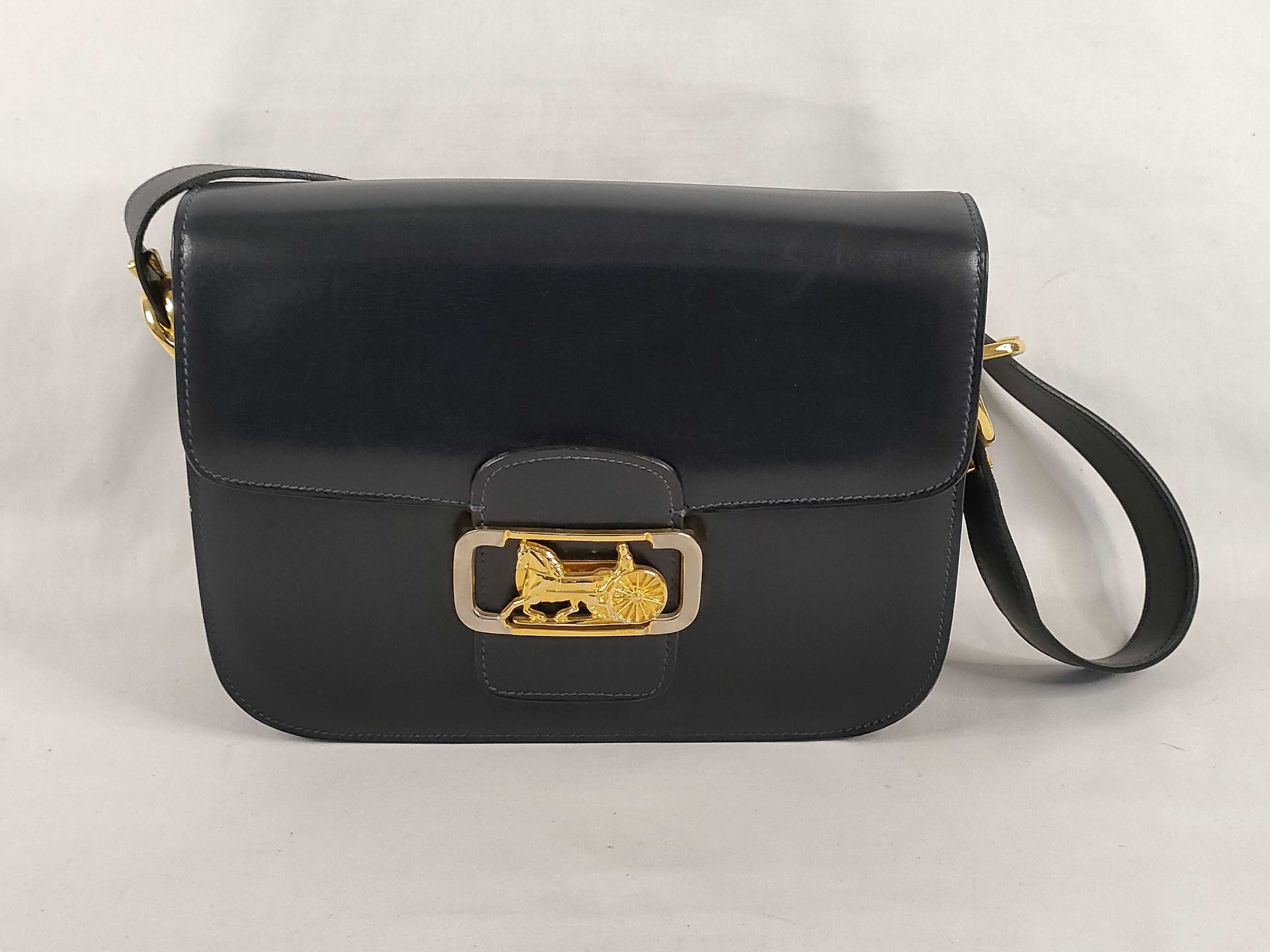shoulder bag with carriage hardware